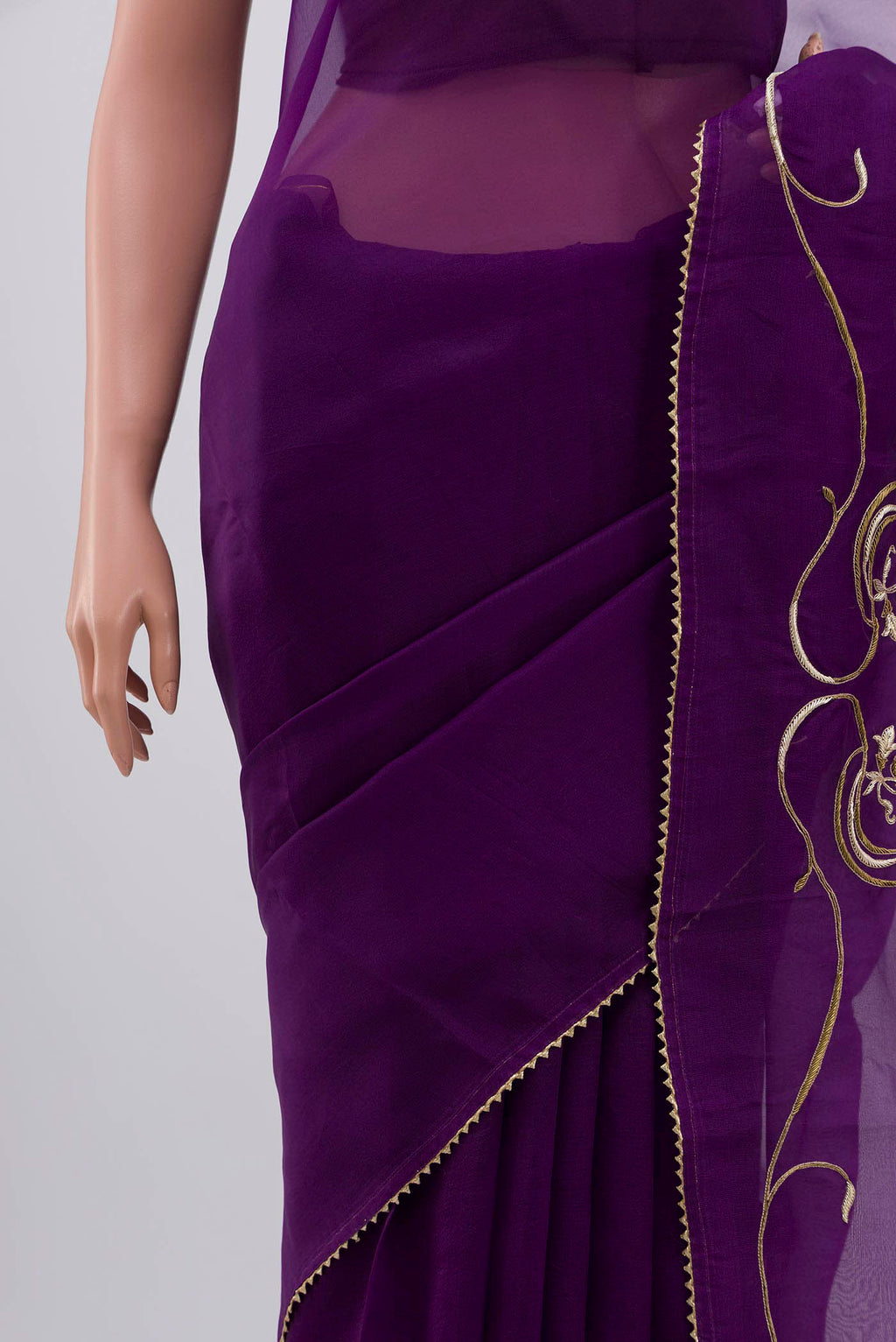 Close up image of the pallu of Violet Organza Silk Saree with Embroidery on the body and Attached Border