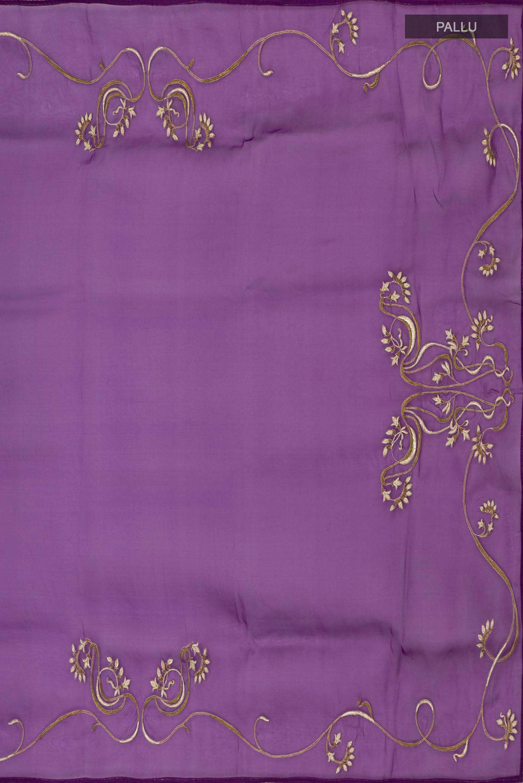 Pleats and pallu of Violet Organza Silk Saree with Embroidery on the body and Attached Border