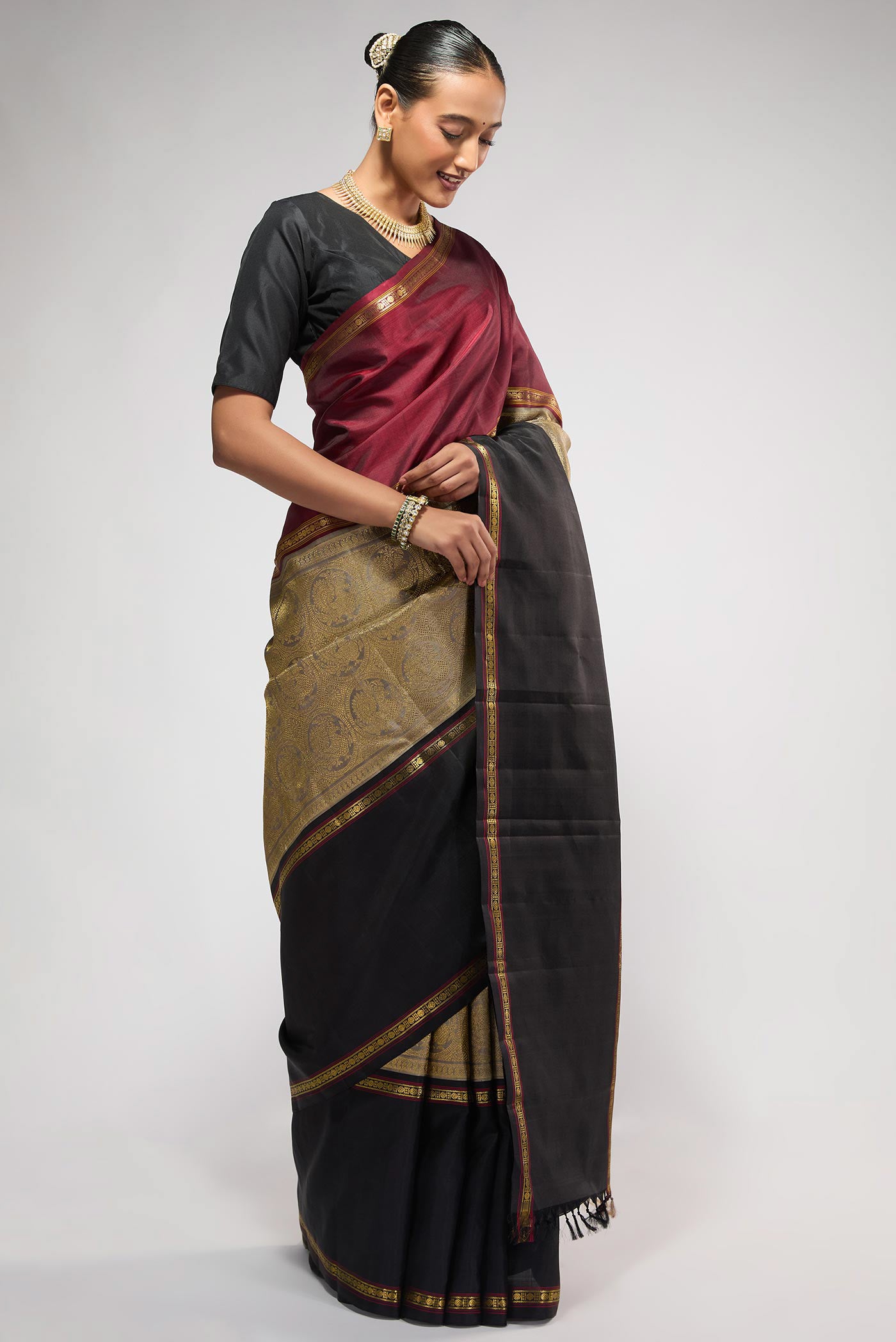 Close up image of the blouse of Pure Silk Pure Zari Grey Kanchipuram Saree with Zari Brocade on the body and Ganga Jamuna Border