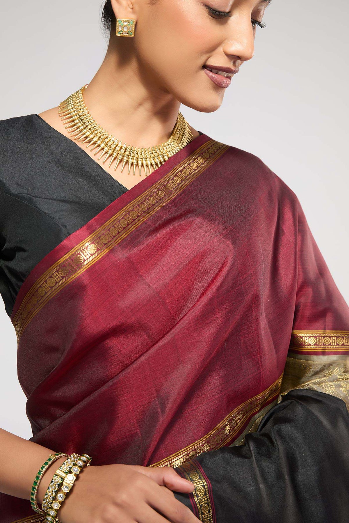 Border image of Pure Silk Pure Zari Grey Kanchipuram Saree with Zari Brocade on the body and Ganga Jamuna Border
