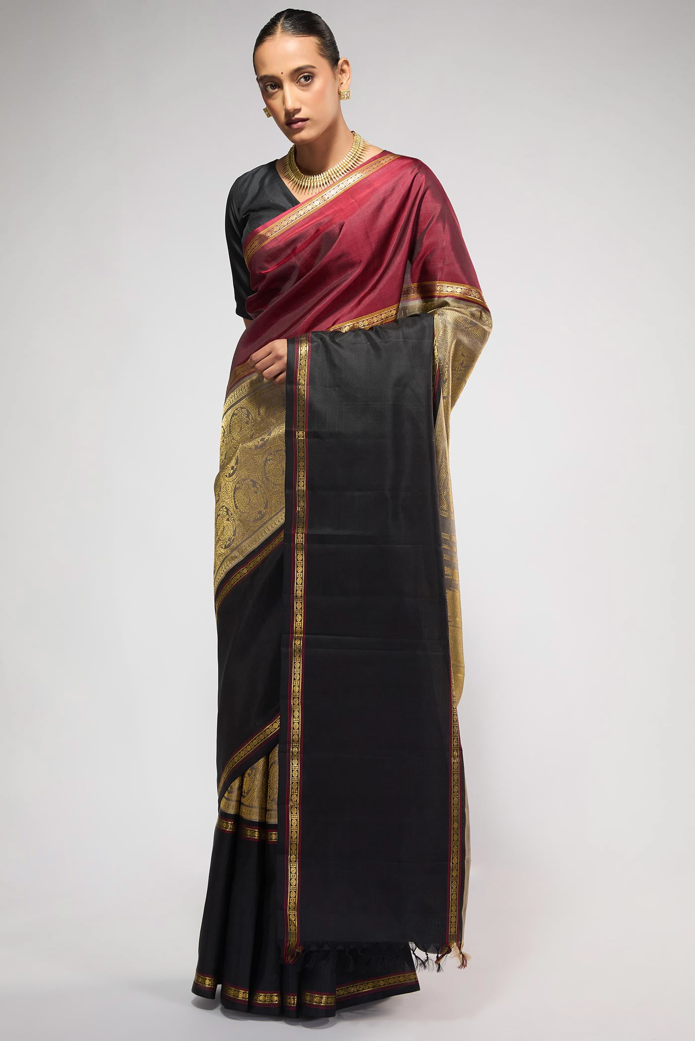 Close up image of the pallu of Pure Silk Pure Zari Grey Kanchipuram Saree with Zari Brocade on the body and Ganga Jamuna Border
