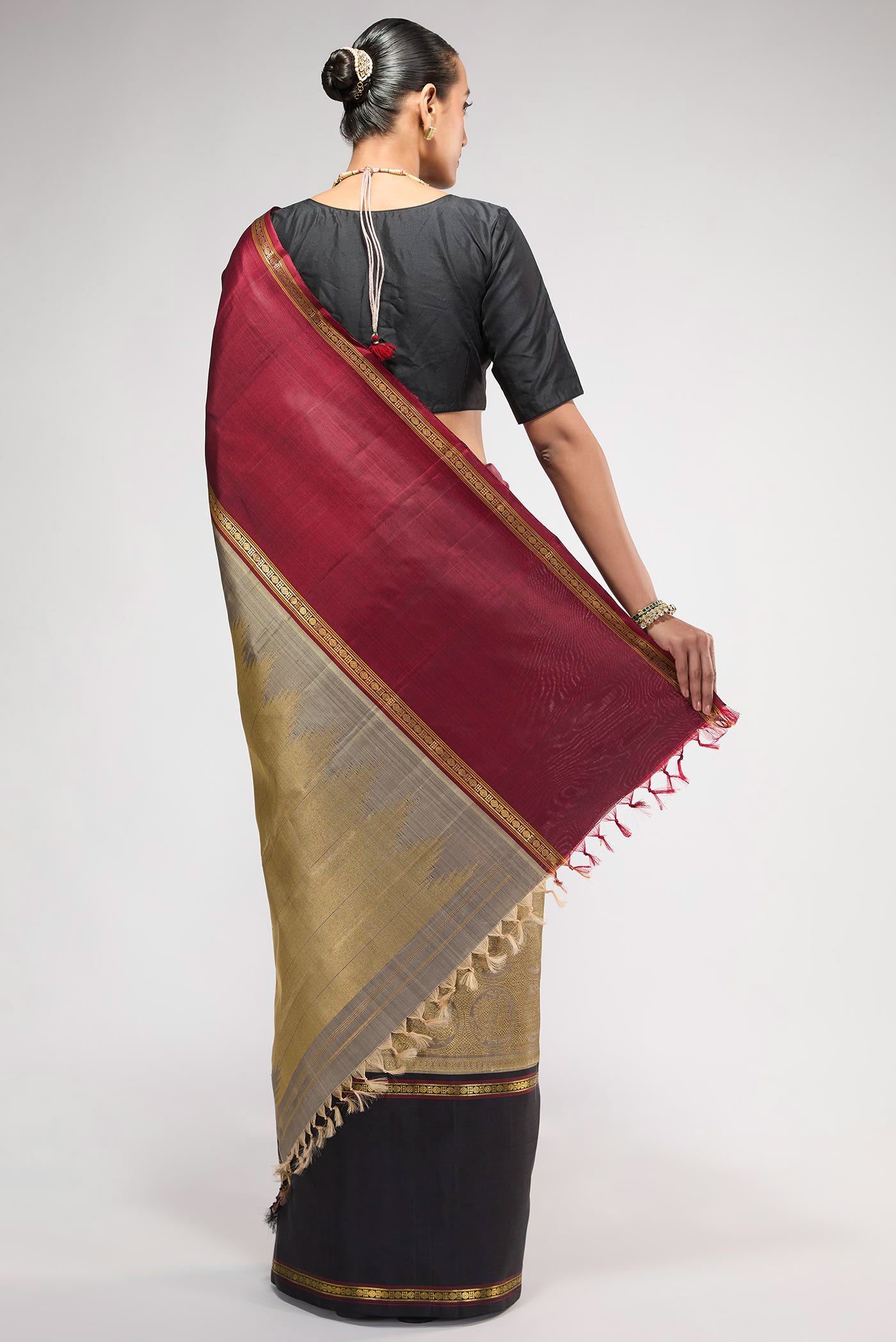 Flat view of Pure Silk Pure Zari Grey Kanchipuram Saree with Zari Brocade on the body and Ganga Jamuna Border