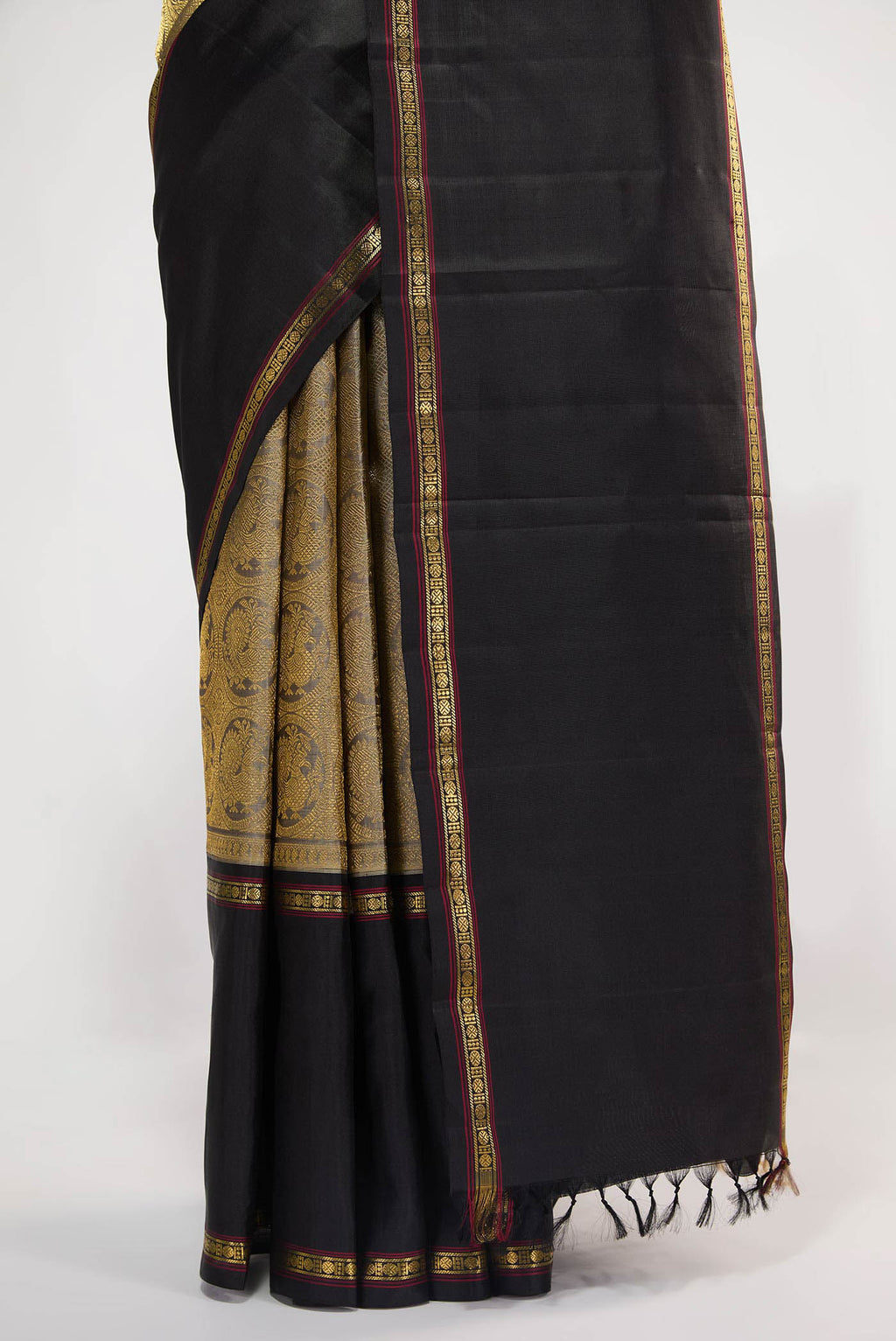 Pleats and pallu of Pure Silk Pure Zari Grey Kanchipuram Saree with Zari Brocade on the body and Ganga Jamuna Border