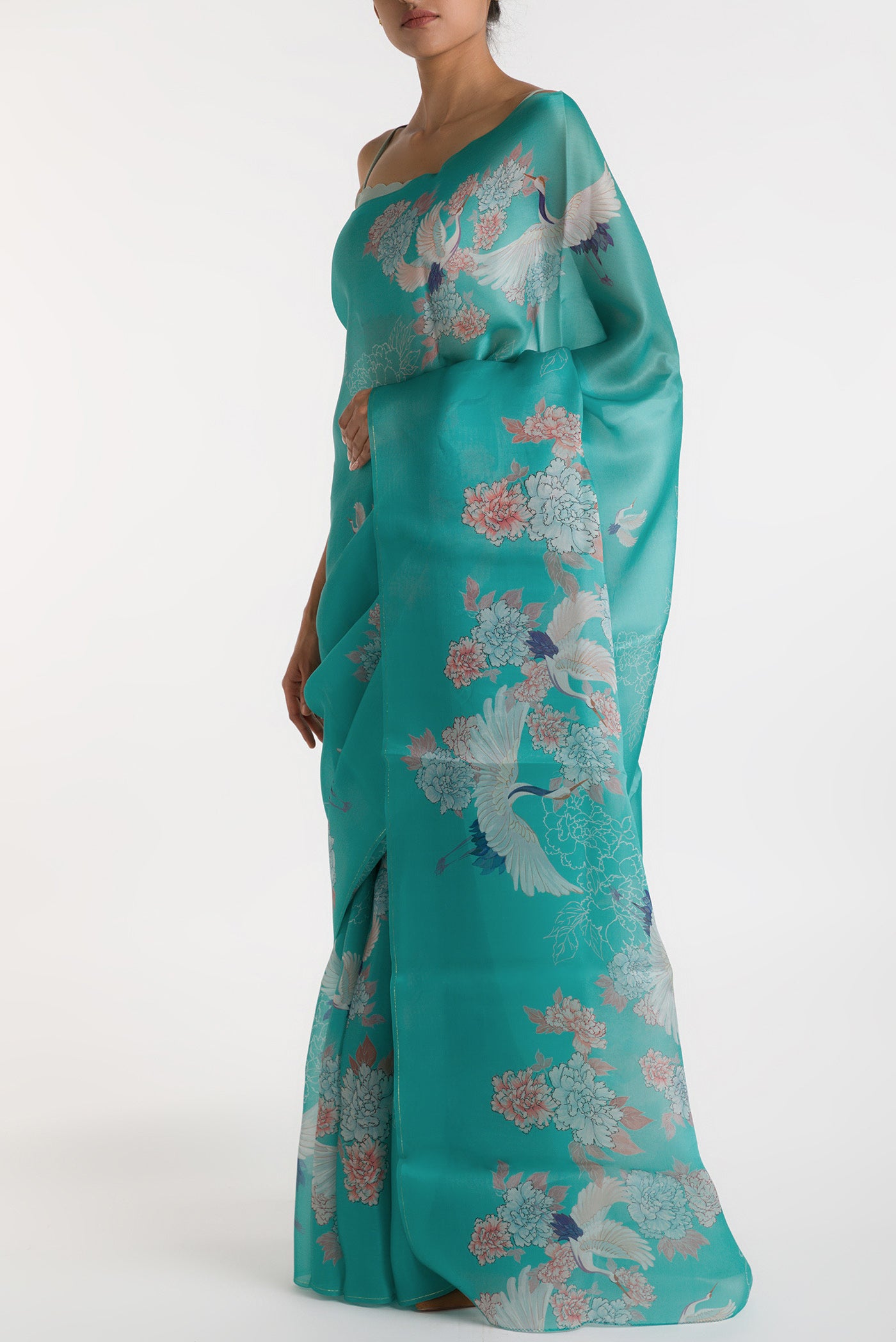 Close up image of the blouse of Light Blue Satin Organza Saree with Bird Print on the body and Without Border