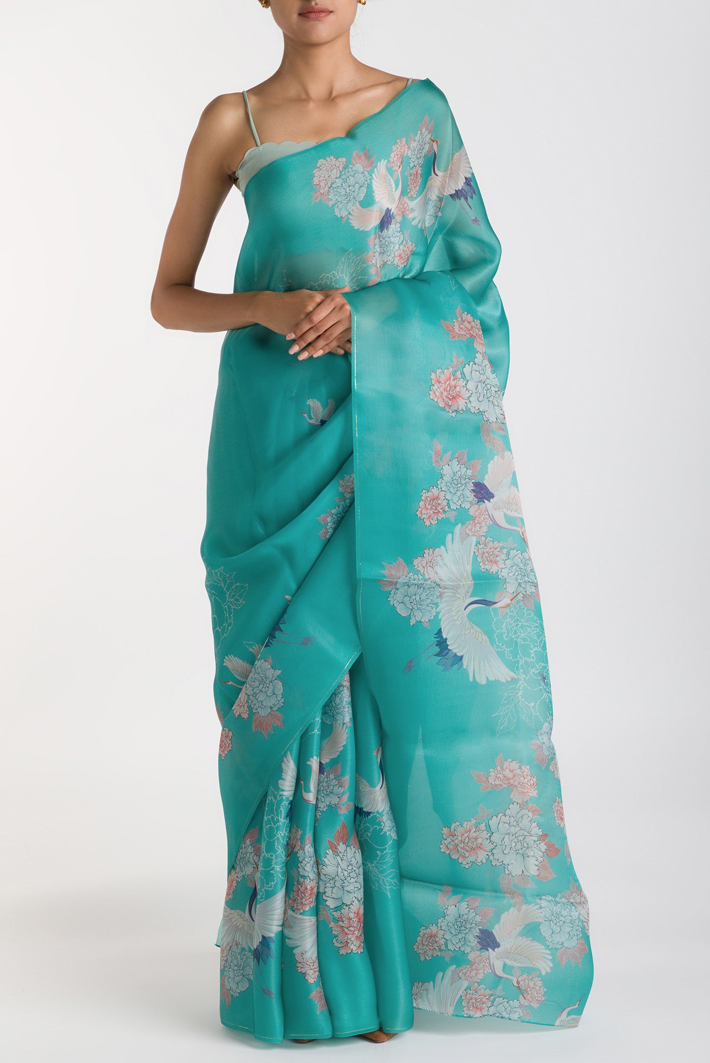 Light Blue Satin Organza Saree with Bird Print on the body and Without Border displayed on a mannequin
