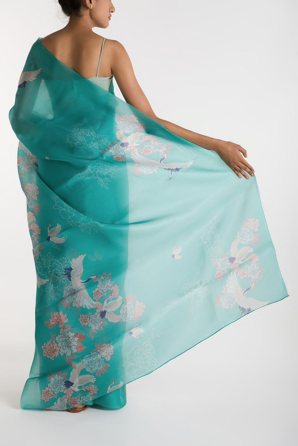 Pleats and pallu of Light Blue Satin Organza Saree with Bird Print on the body and Without Border