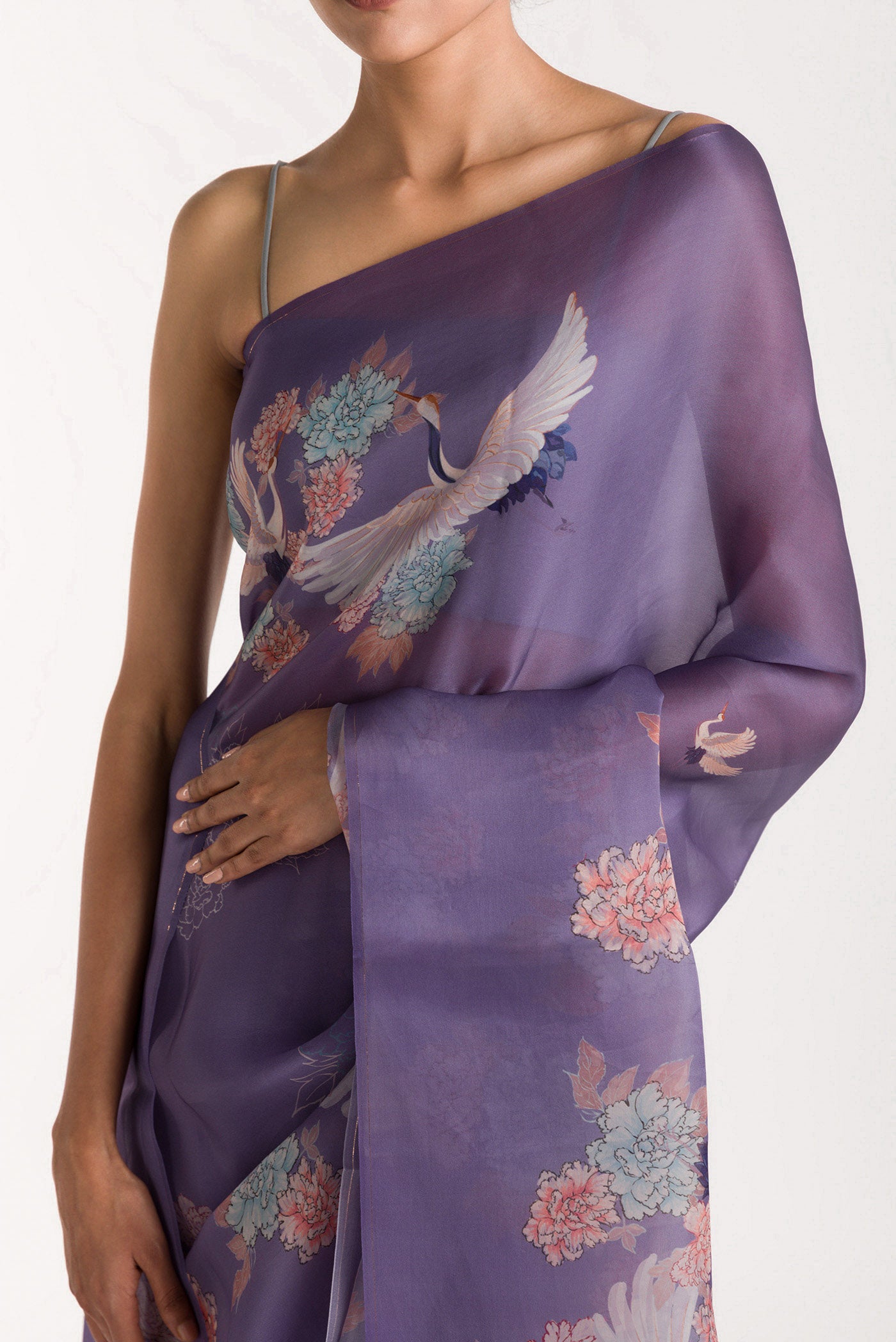 Close up of Lilac Satin Organza Saree with Bird Print on the body and Without Border displaying folds