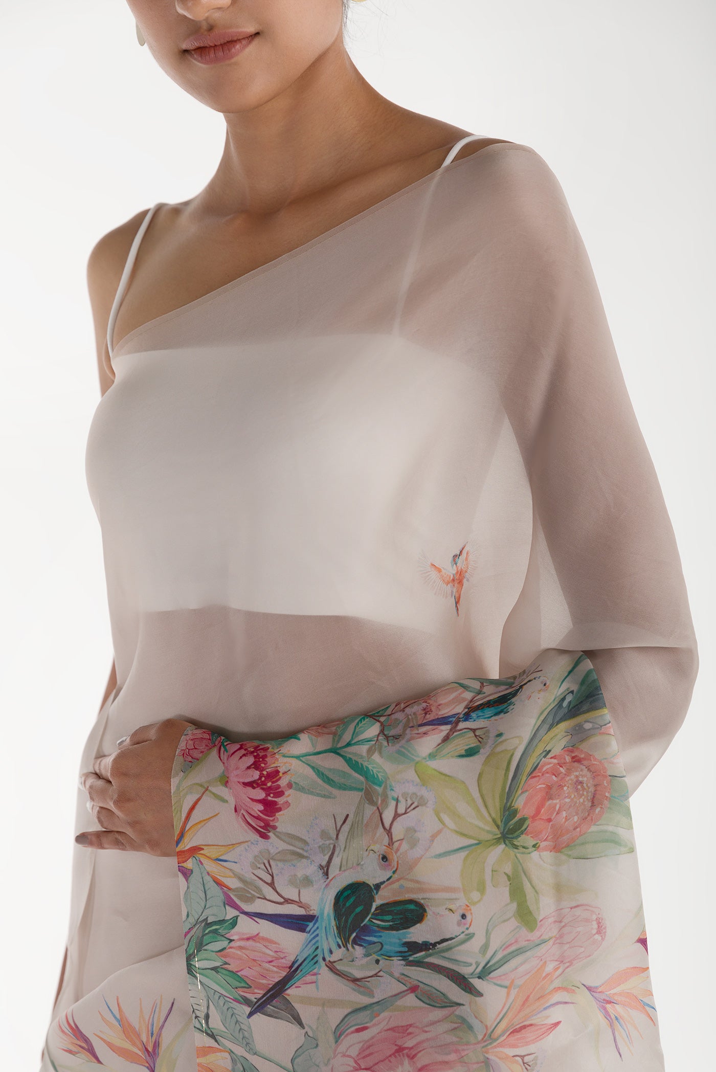 Close up of White Satin Organza Saree with Bird Print on the body and Without Border displaying folds