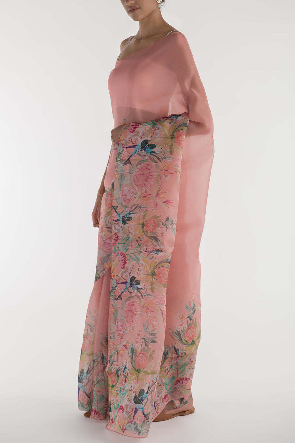 Close up image of the blouse of Peach Satin Organza Saree with Bird Print on the body and Without Border