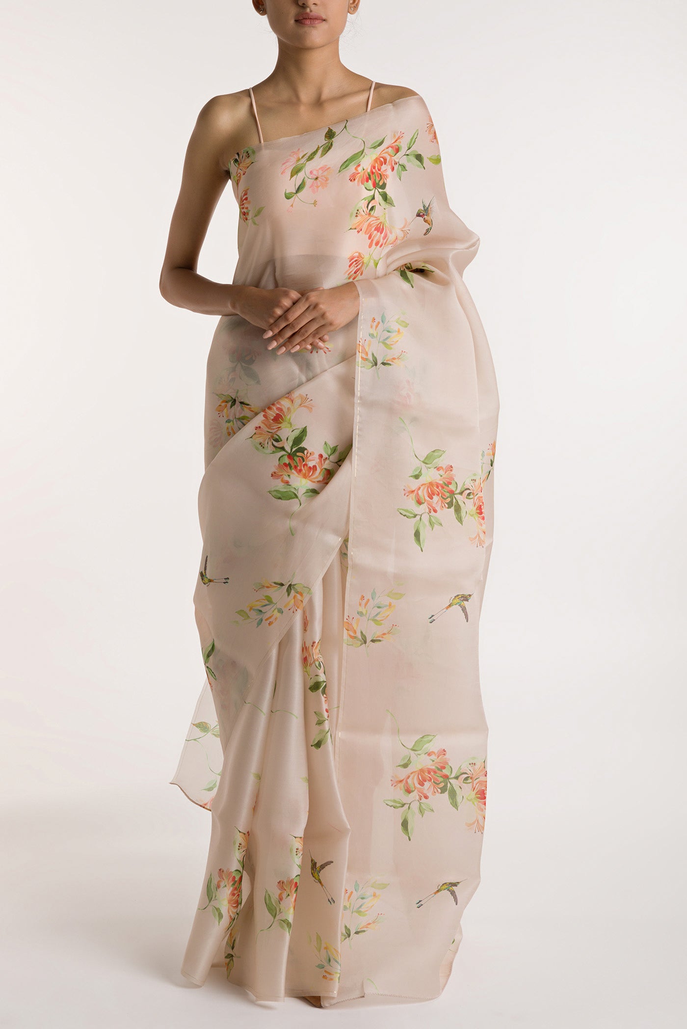 White Satin Organza Saree with Bird Print on the body and Without Border displayed on a mannequin