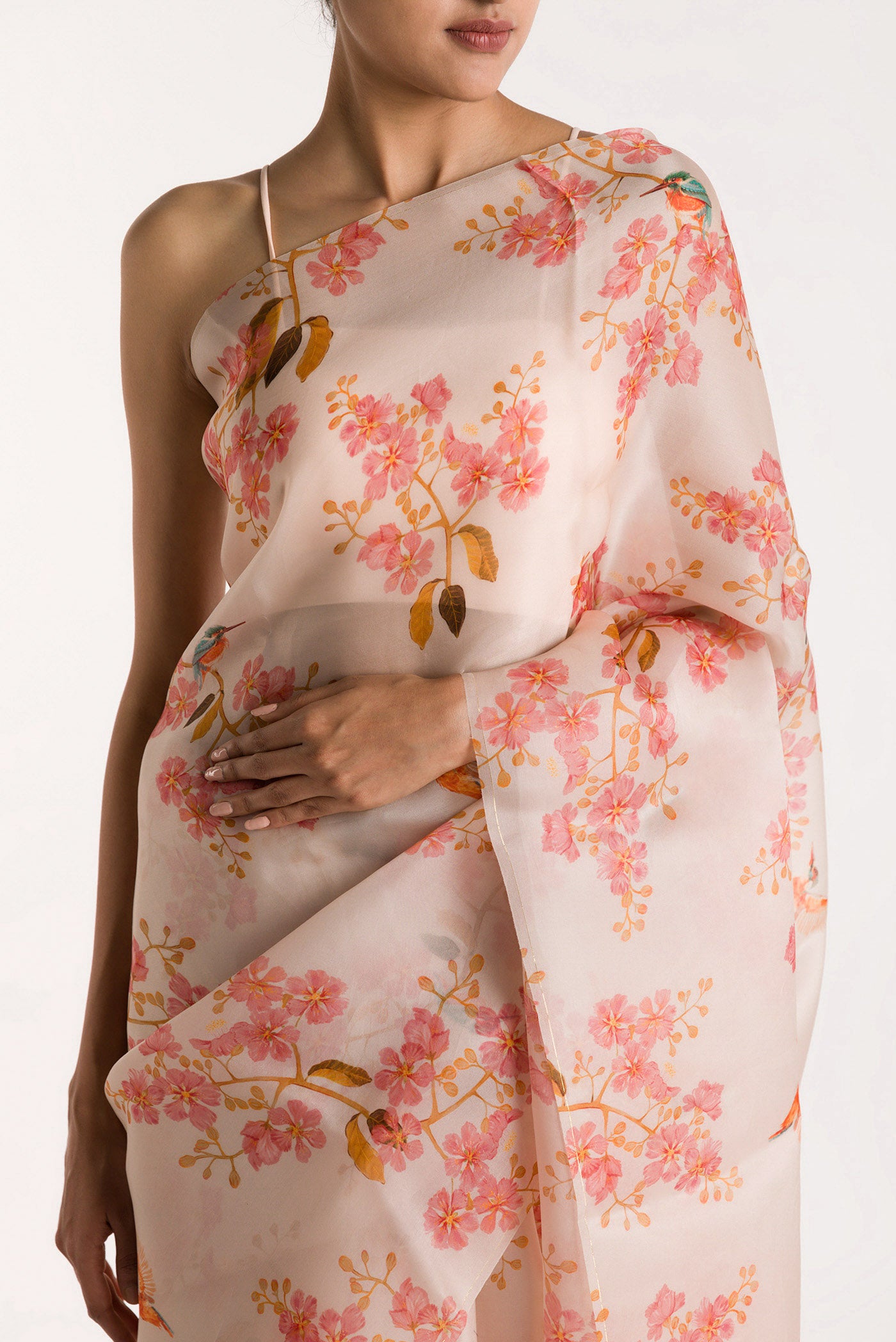 Close up of White Satin Organza Saree with Bird Print on the body and Without Border displaying folds