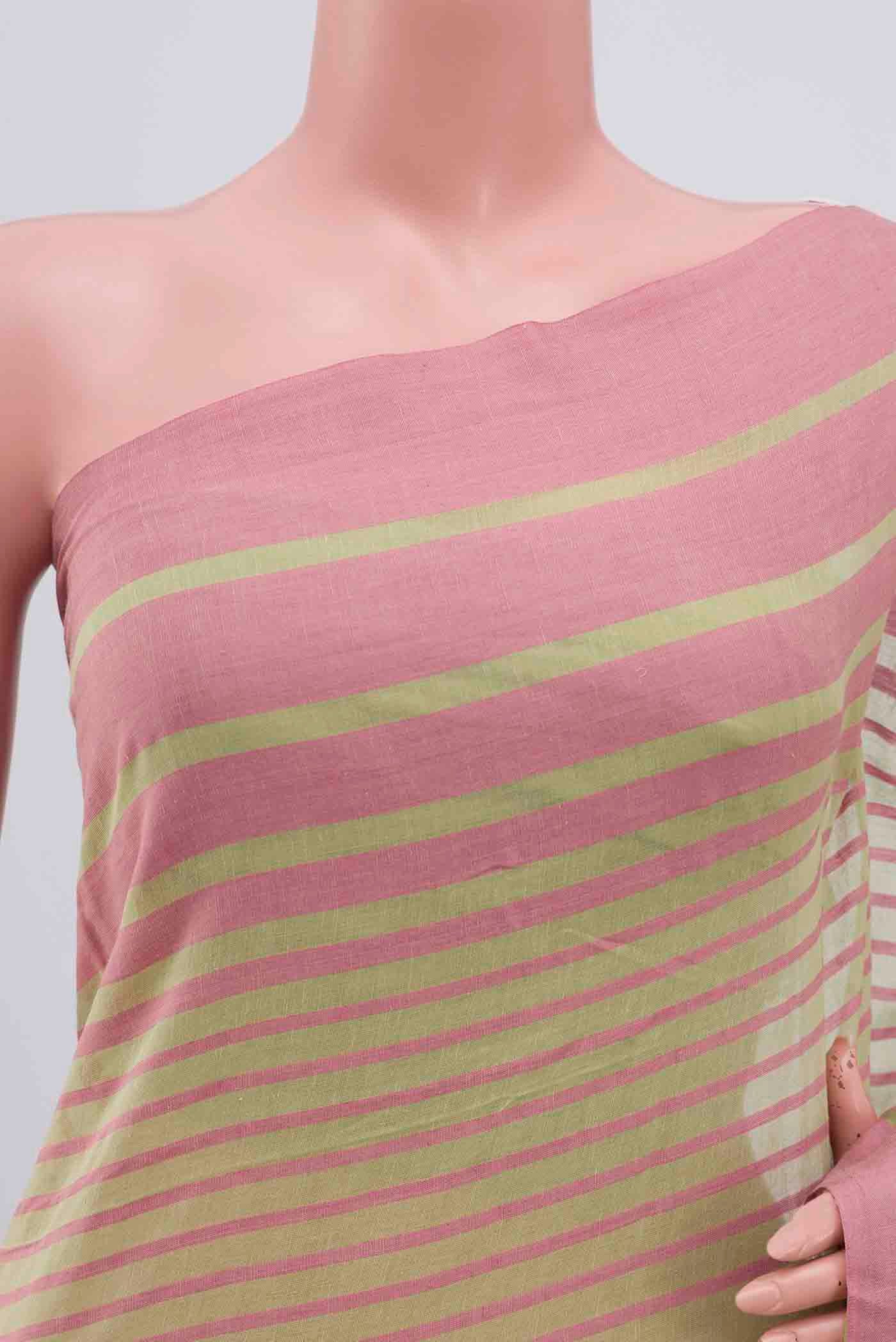 Close up of Titli, framed with proportioned stripes that gradually narrow towards the body, bringing together a vibrant palette in harmony Where the border and pallu stripes meet, tiny checks appear, evoking abstract butterflies - delicate creatures of spring and summer The plain body offers soft contrast, allowing the colours to shine On the pallu, these stripes return as subtle checks, adding a light, balanced finish displaying folds