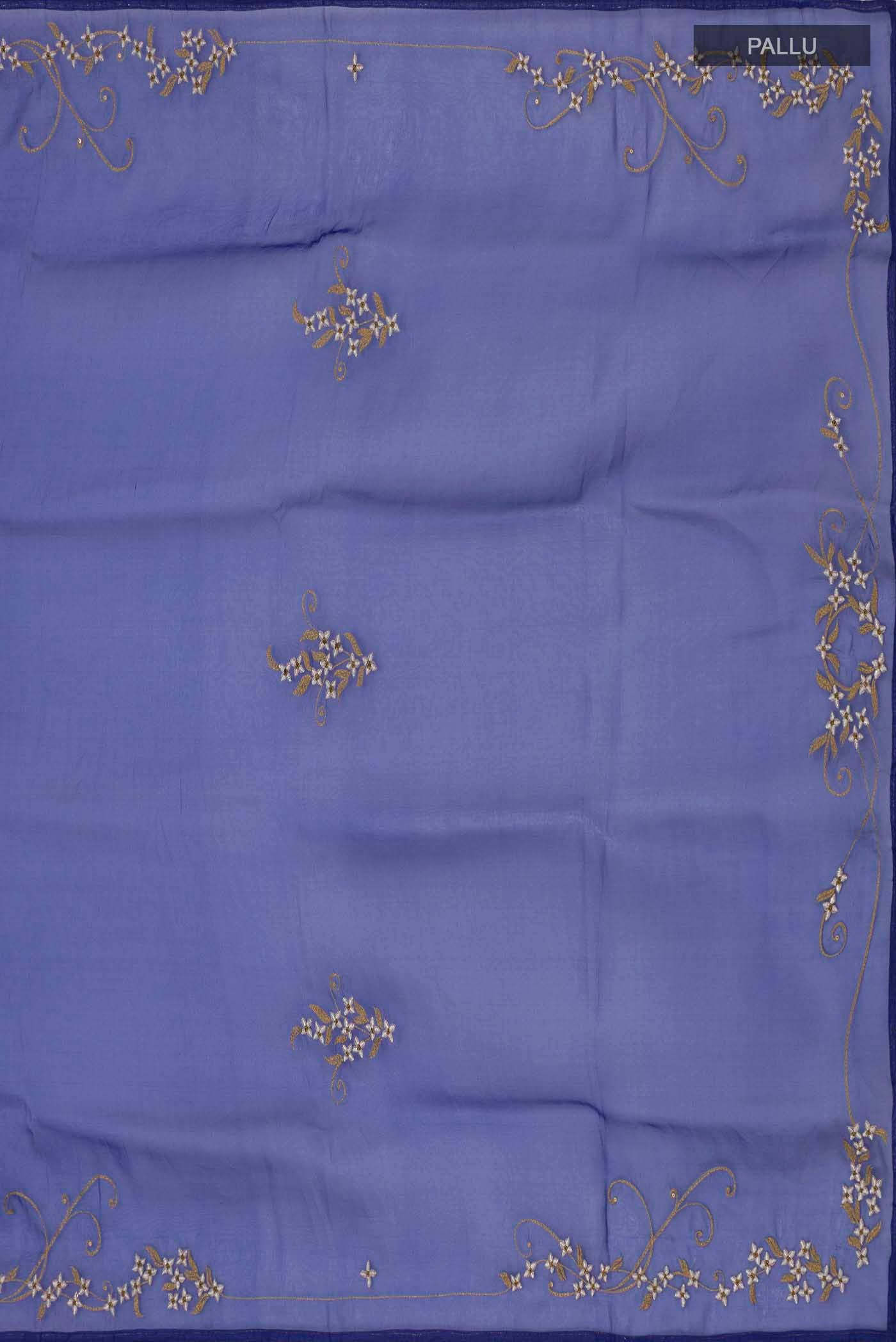 Close up image of the pallu of Blue Organza Silk Saree with Plain Body and Embroidery Border
