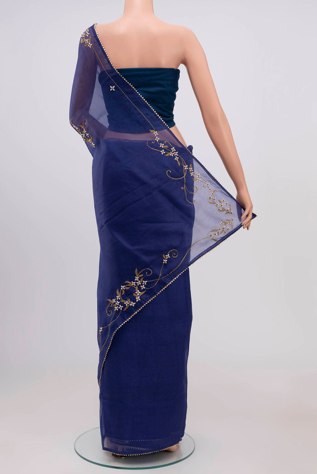 Pleats and pallu of Blue Organza Silk Saree with Plain Body and Embroidery Border