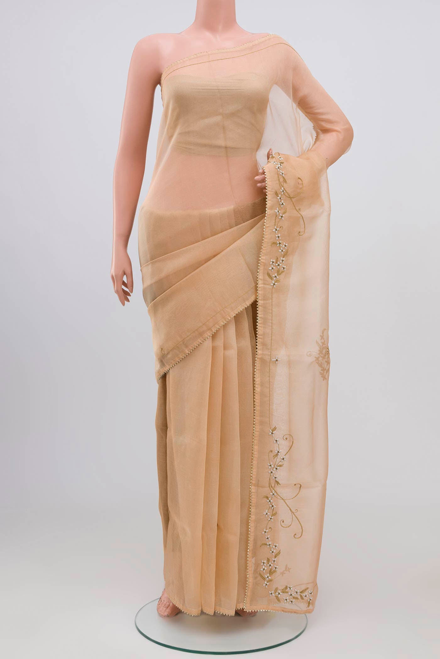 Sandal Organza Silk Saree with Plain Body and Embroidery Border displayed on a mannequin