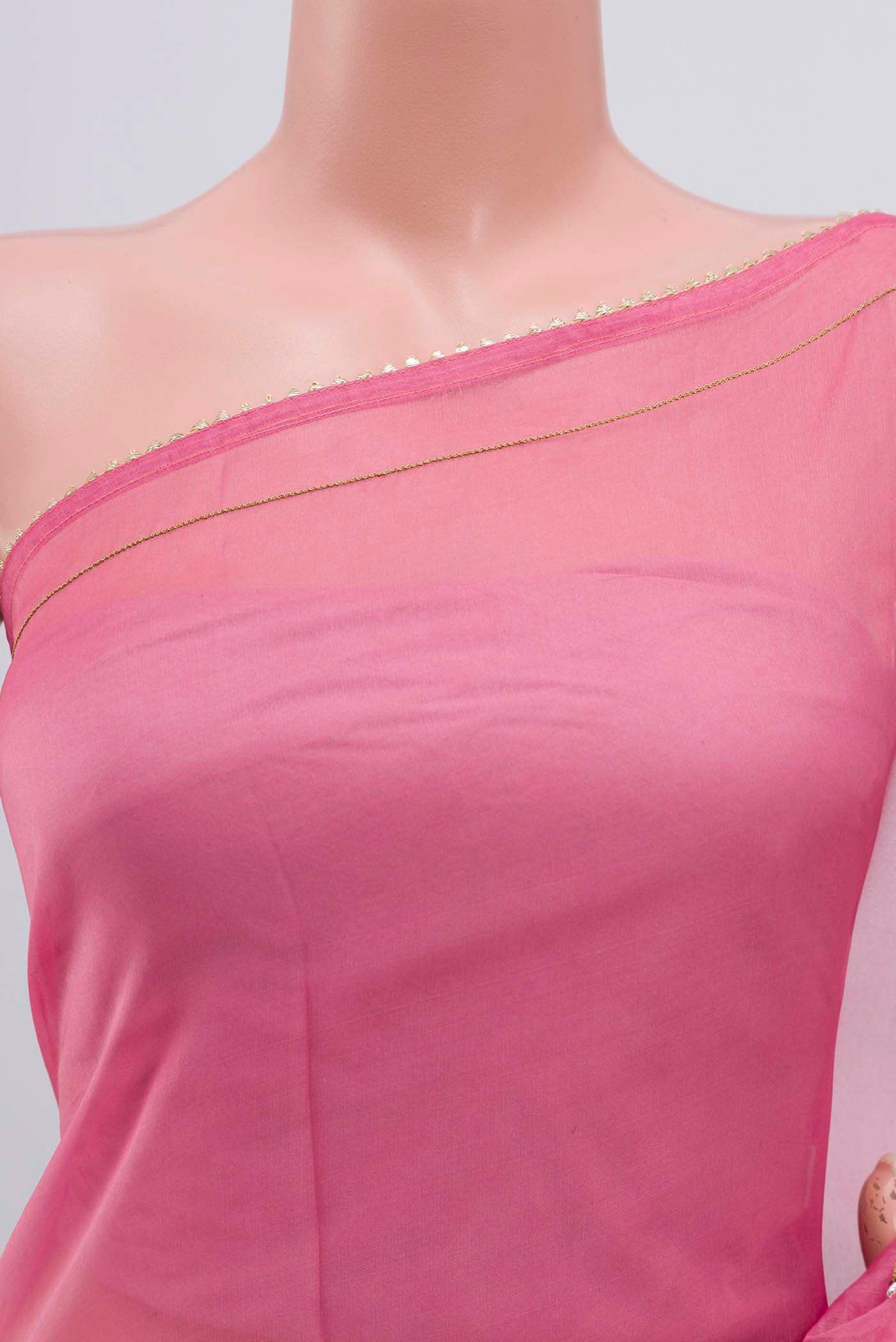 Close up of Pink Organza Silk Saree with Plain Body and Embroidery Border displaying folds