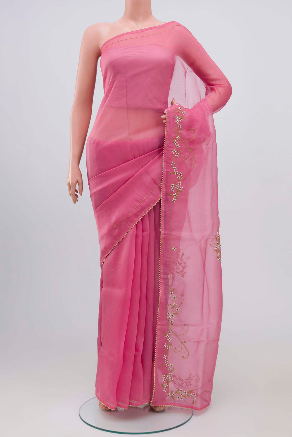 Pink Organza Silk Saree with Plain Body and Embroidery Border displayed on a mannequin