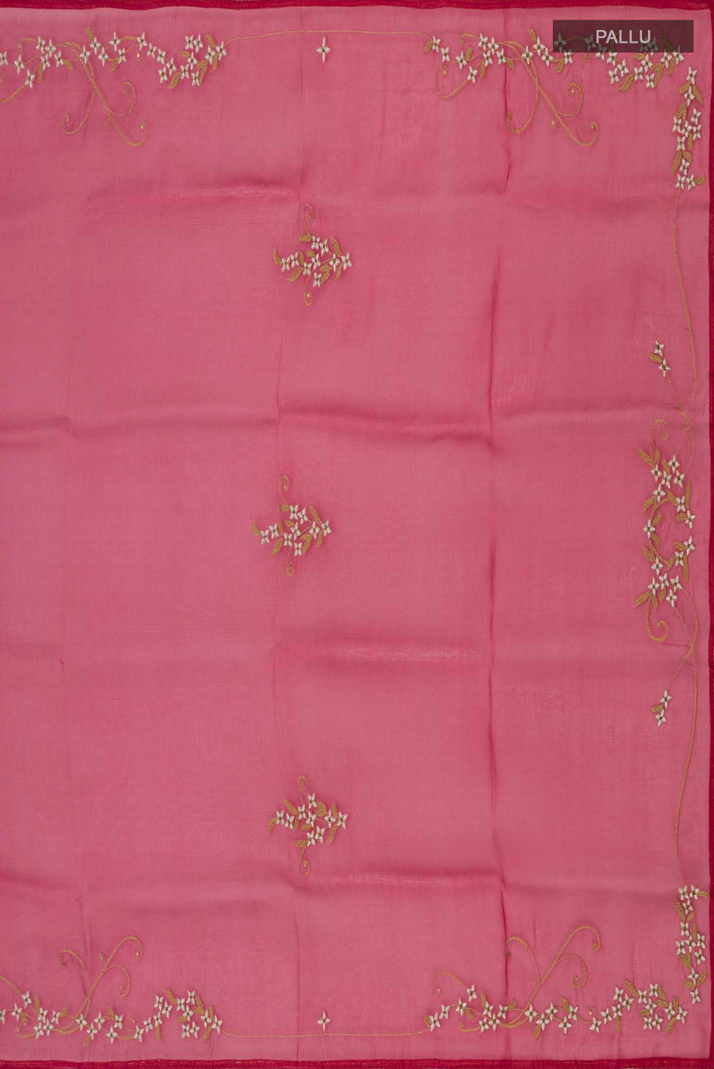 Close up image of the pallu of Maroon Organza Silk Saree with Plain Body and Embroidery Border