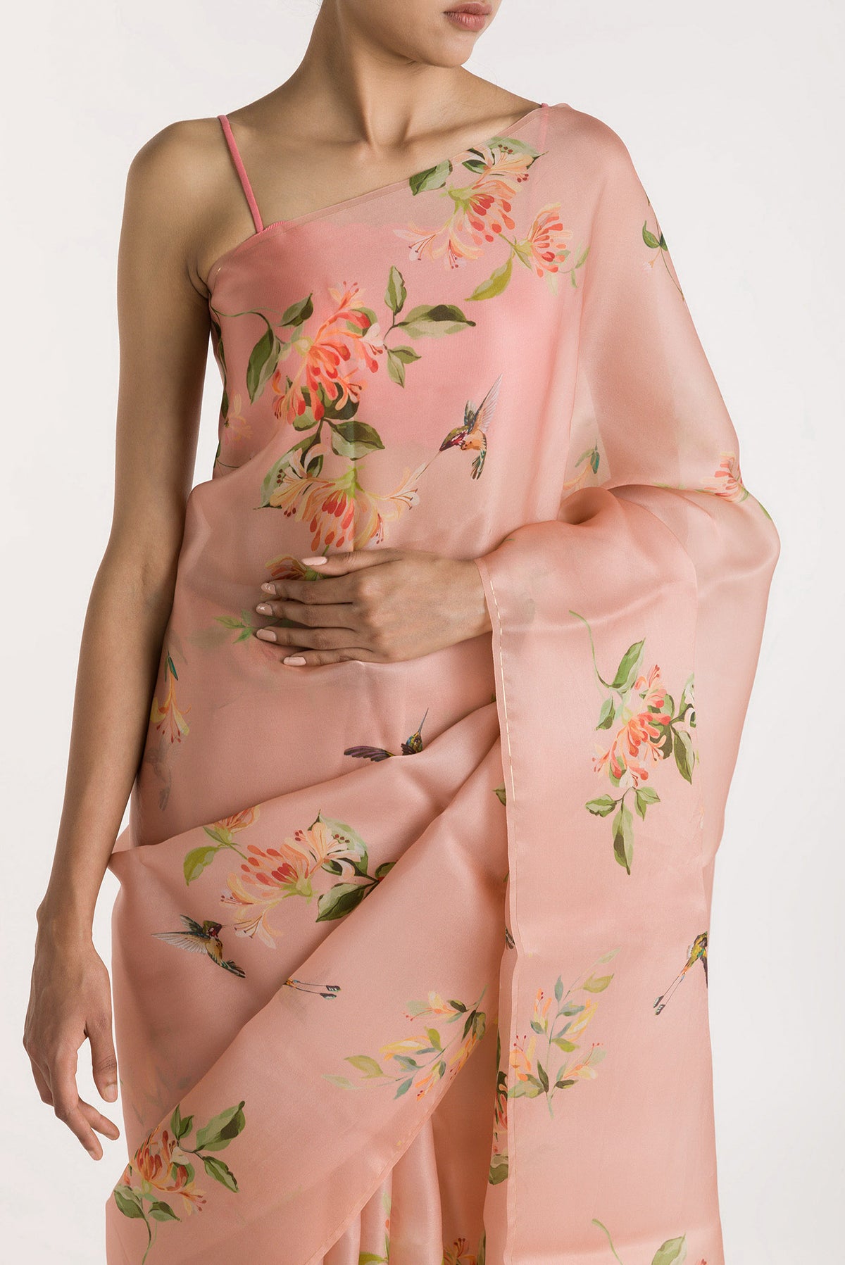 Close up of Pink Satin Organza Saree with Bird Print on the body and Without Border displaying folds