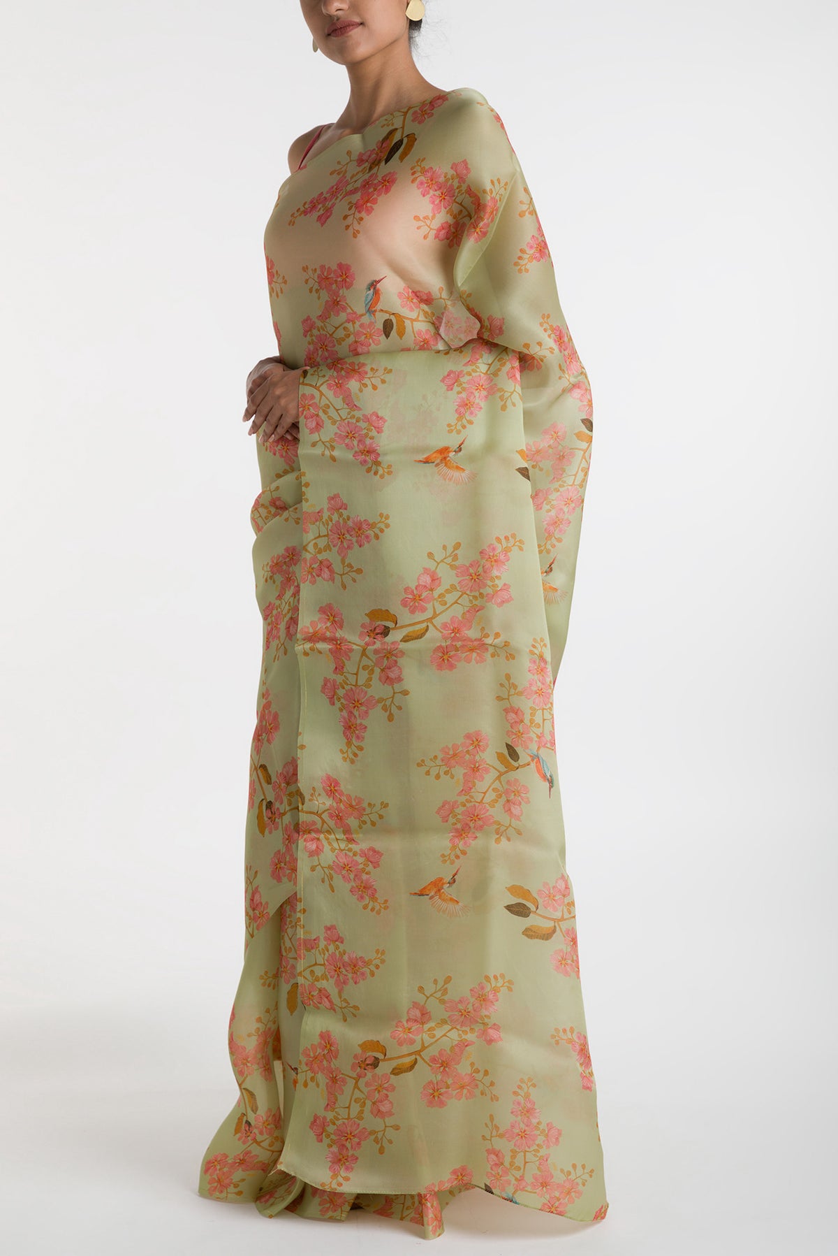 Close up image of the blouse of Green Satin Organza Saree with Bird Print on the body and Without Border