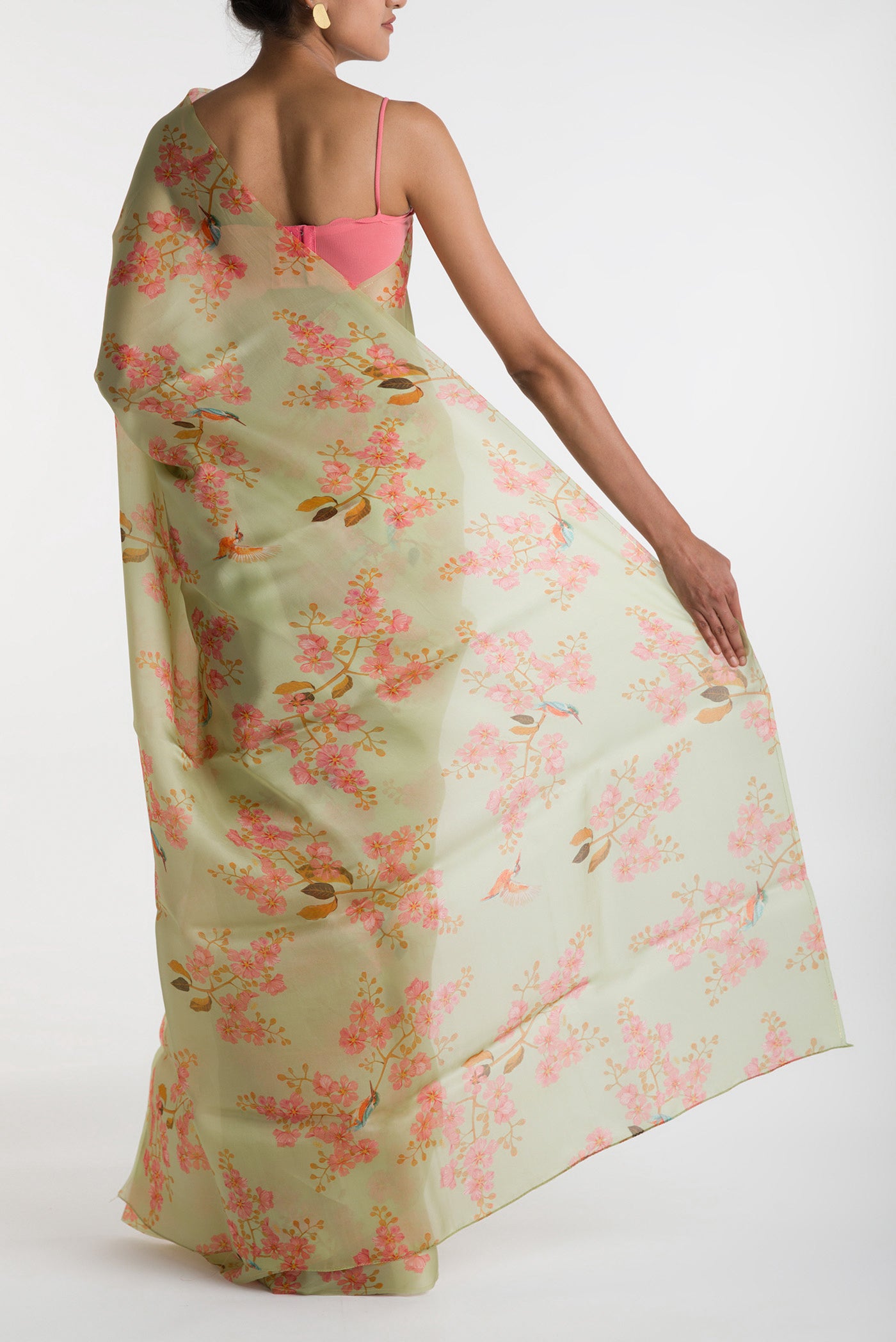 Pleats and pallu of Green Satin Organza Saree with Bird Print on the body and Without Border