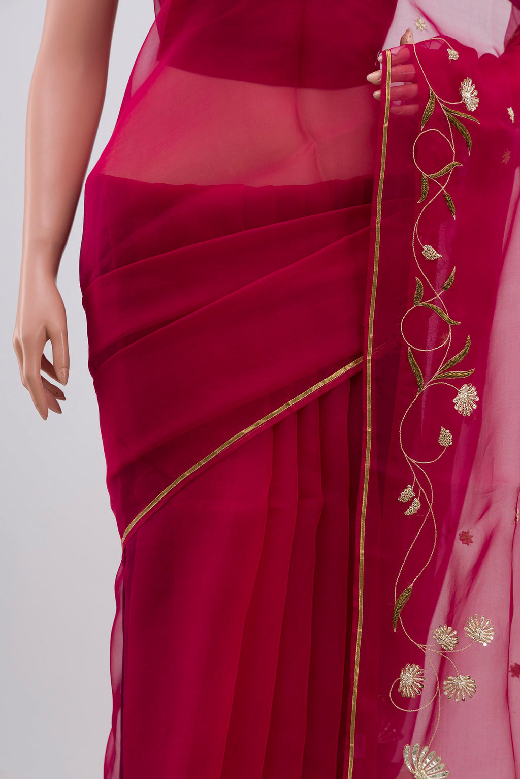 Pleats and pallu of Pink Organza Silk Saree with Embroidery on the body and Embroidery Border