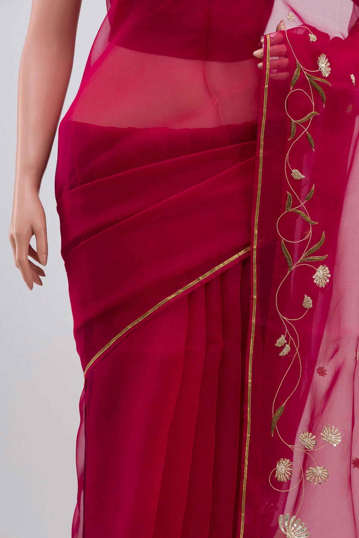Pleats and pallu of Pink Organza Silk Saree with Embroidery on the body and Embroidery Border