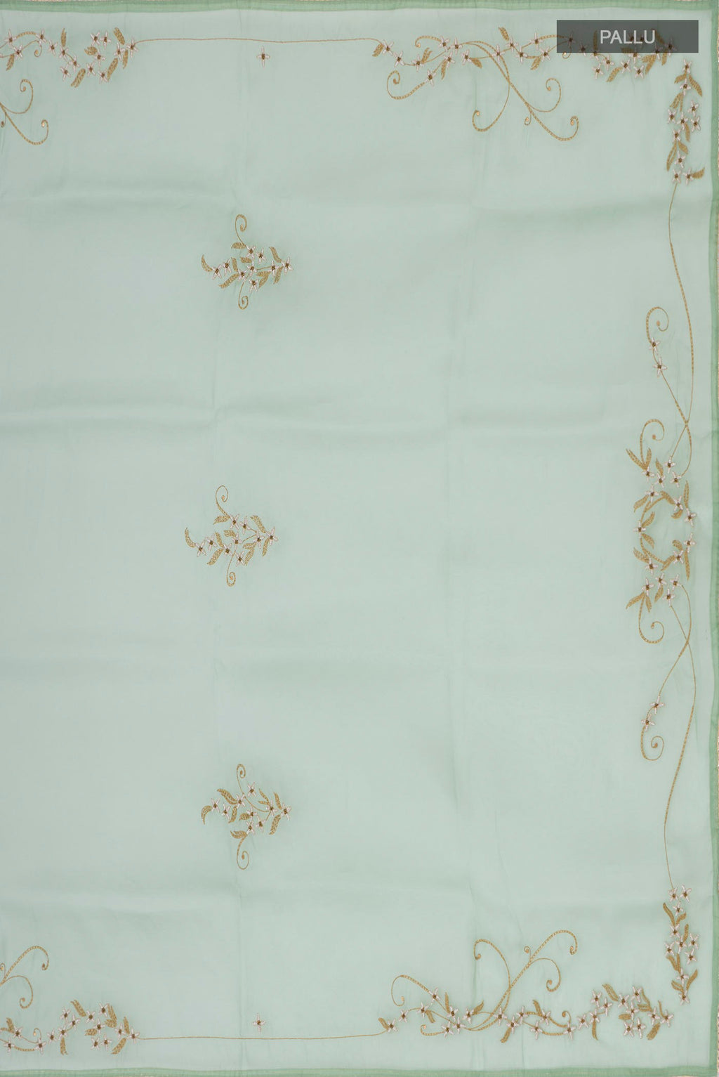 Close up image of the pallu of Green Organza Silk Saree with Embroidery on the body and Embroidery Border