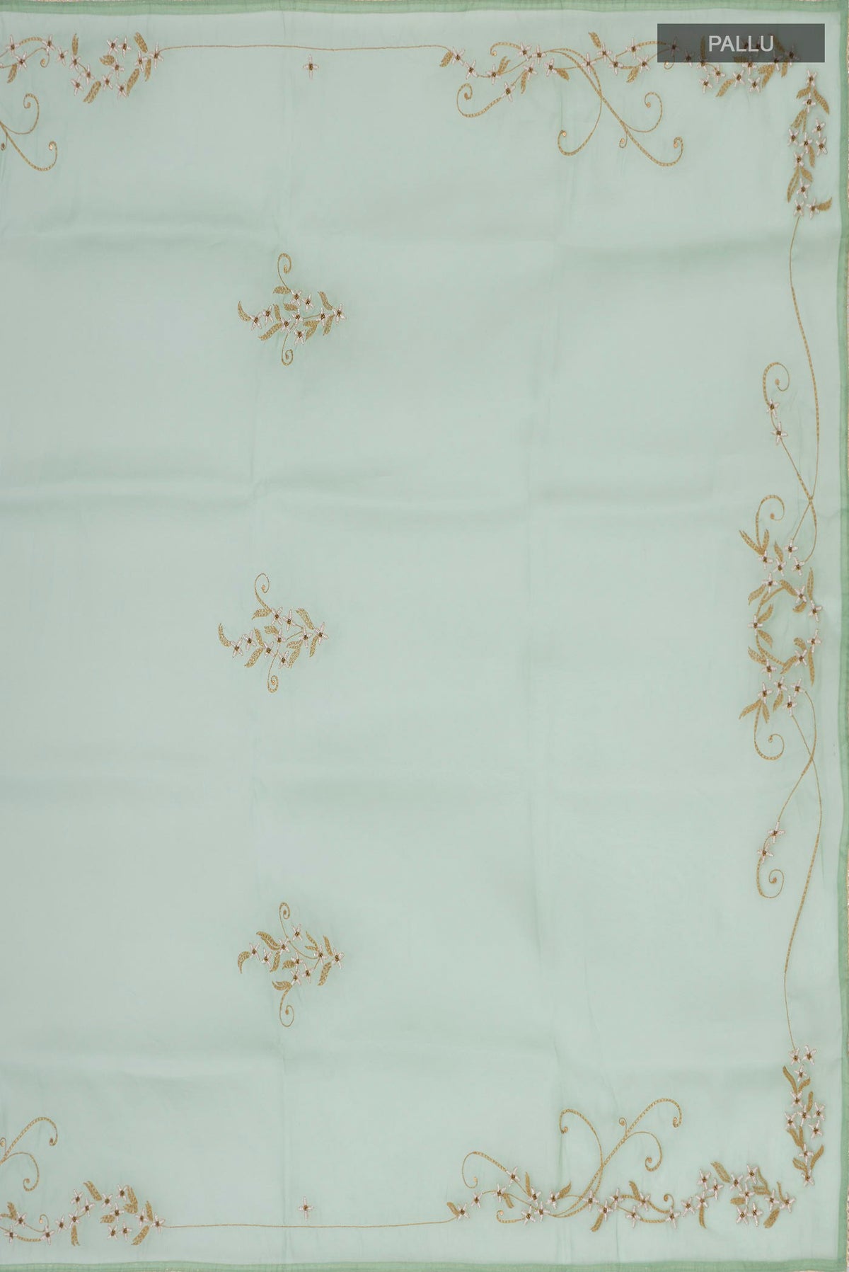 Close up image of the pallu of Green Organza Silk Saree with Embroidery on the body and Embroidery Border