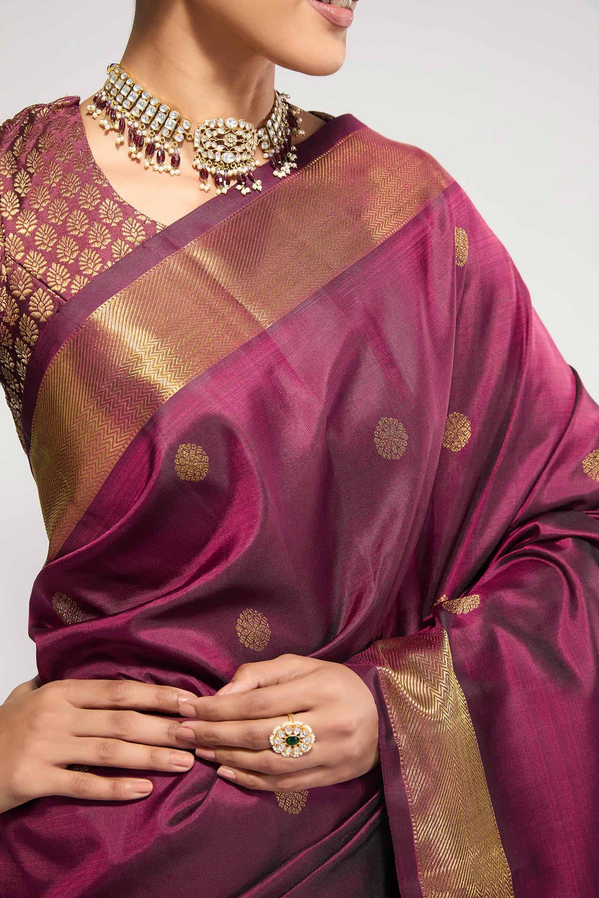 Border image of Pure Silk Pure Zari Maroon Kanchipuram Saree with Zari Butta on the body and Zari Border