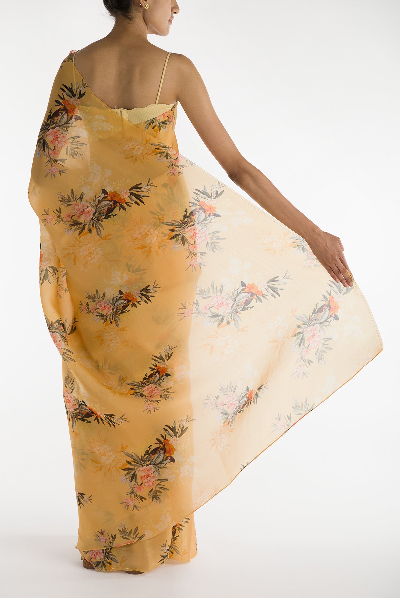 Pleats and pallu of Yellow Satin Organza Saree with Bird Print on the body and Without Border