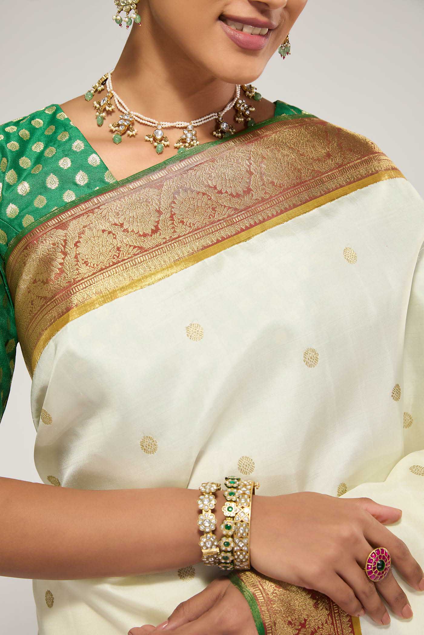 Border image of Pure Silk Pure Zari Off White Kanchipuram Saree with Zari Butta on the body and Zari Border