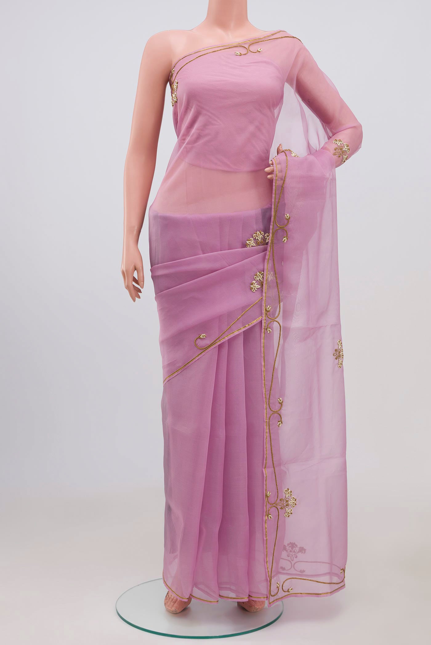 Pink Organza Silk Saree with Embroidery on the body and Embroidery Border displayed on a mannequin