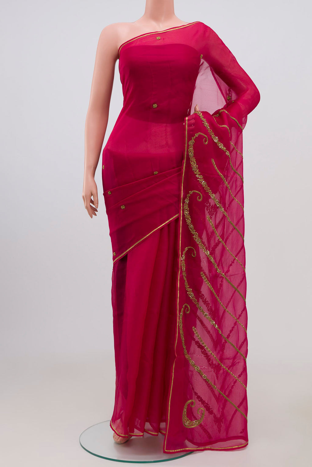Pink Organza Silk Saree with Embroidery on the body and Embroidery Border displayed on a mannequin