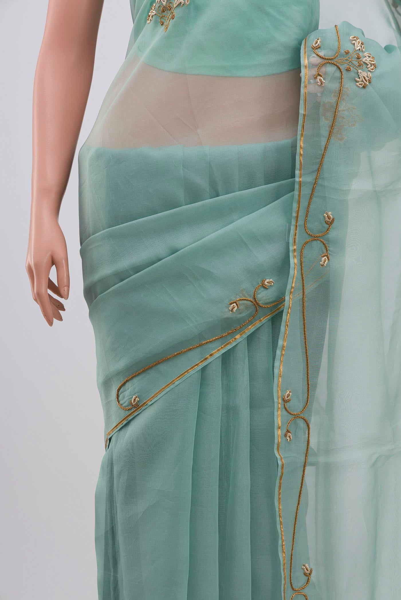 Border image of Green Organza Silk Saree with Embroidery on the body and Embroidery Border