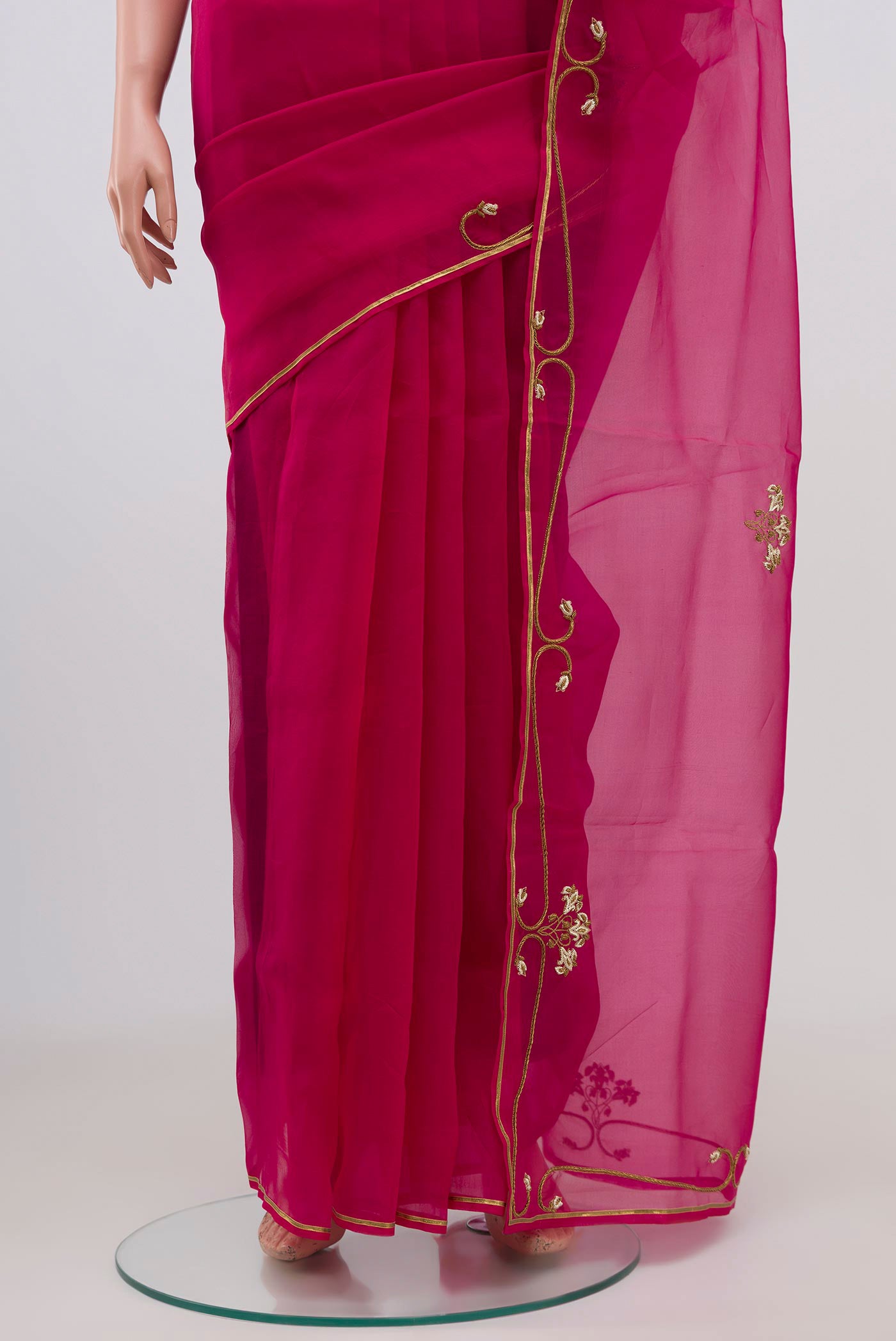 Pleats and pallu of Pink Organza Silk Saree with Embroidery on the body and Embroidery Border