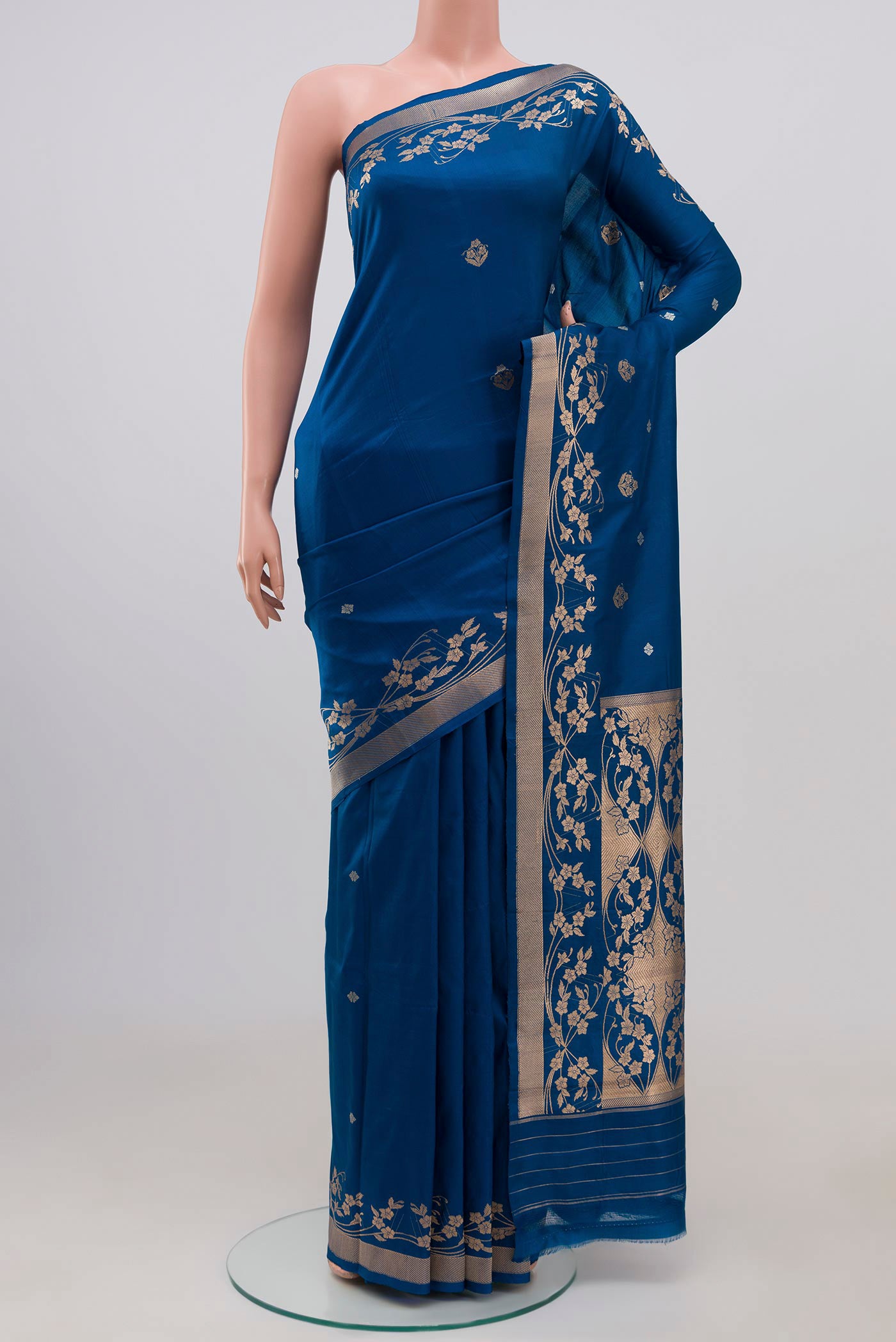 Blue Banarasi Katan Silk Saree with Zari Butta on the body and Zari Border displayed on a mannequin
