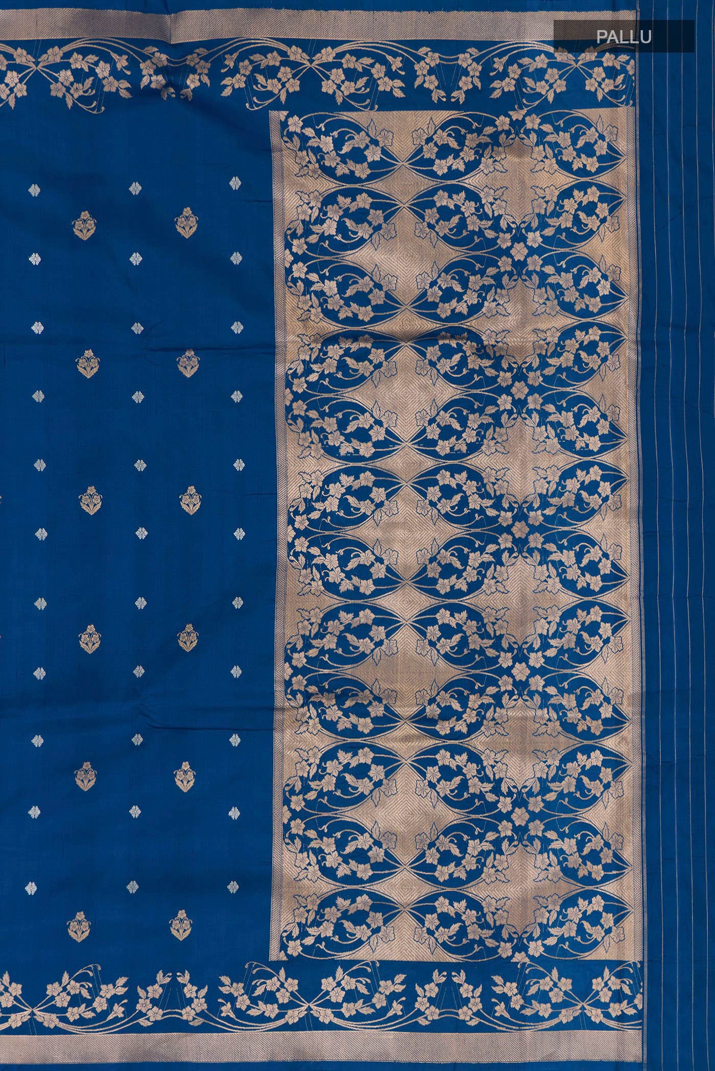 Close up image of the pallu of Blue Banarasi Katan Silk Saree with Zari Butta on the body and Zari Border