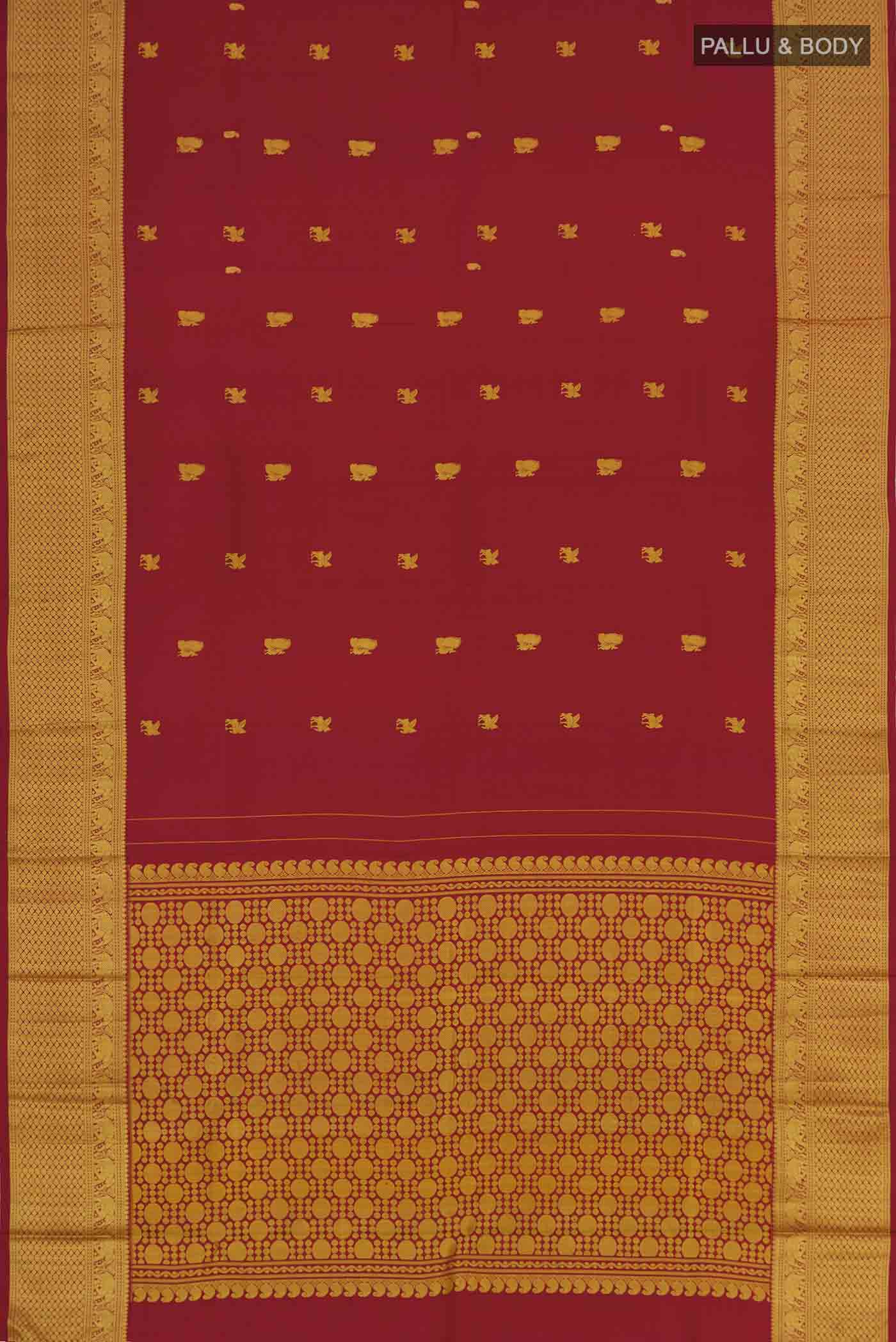 Flat view of Maroon Kanchipuram Silk Saree with Thread Butta on the body and Thread Border