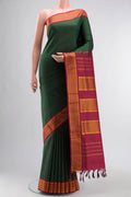 Pure Silk Pure Zari Green Kanchipuram Nine Yards Saree with Stripes on the body and Zari Border displayed on a mannequin