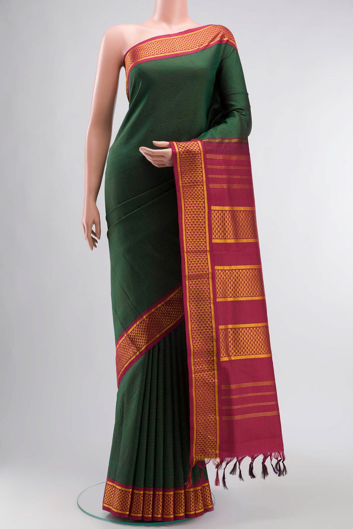 Pure Silk Pure Zari Green Kanchipuram Nine Yards Saree with Stripes on the body and Zari Border displayed on a mannequin