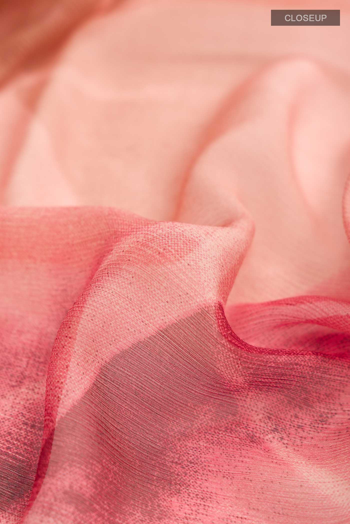 Close up of Coral Mysore Chiffon Saree with Geometric Print on the body and Without Border displaying folds