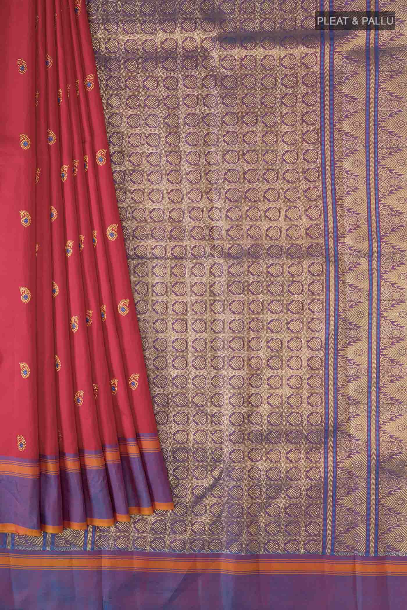 Pleats and pallu of Red Kanchipuram Silk Saree with Zari Butta on the body and Plain Border