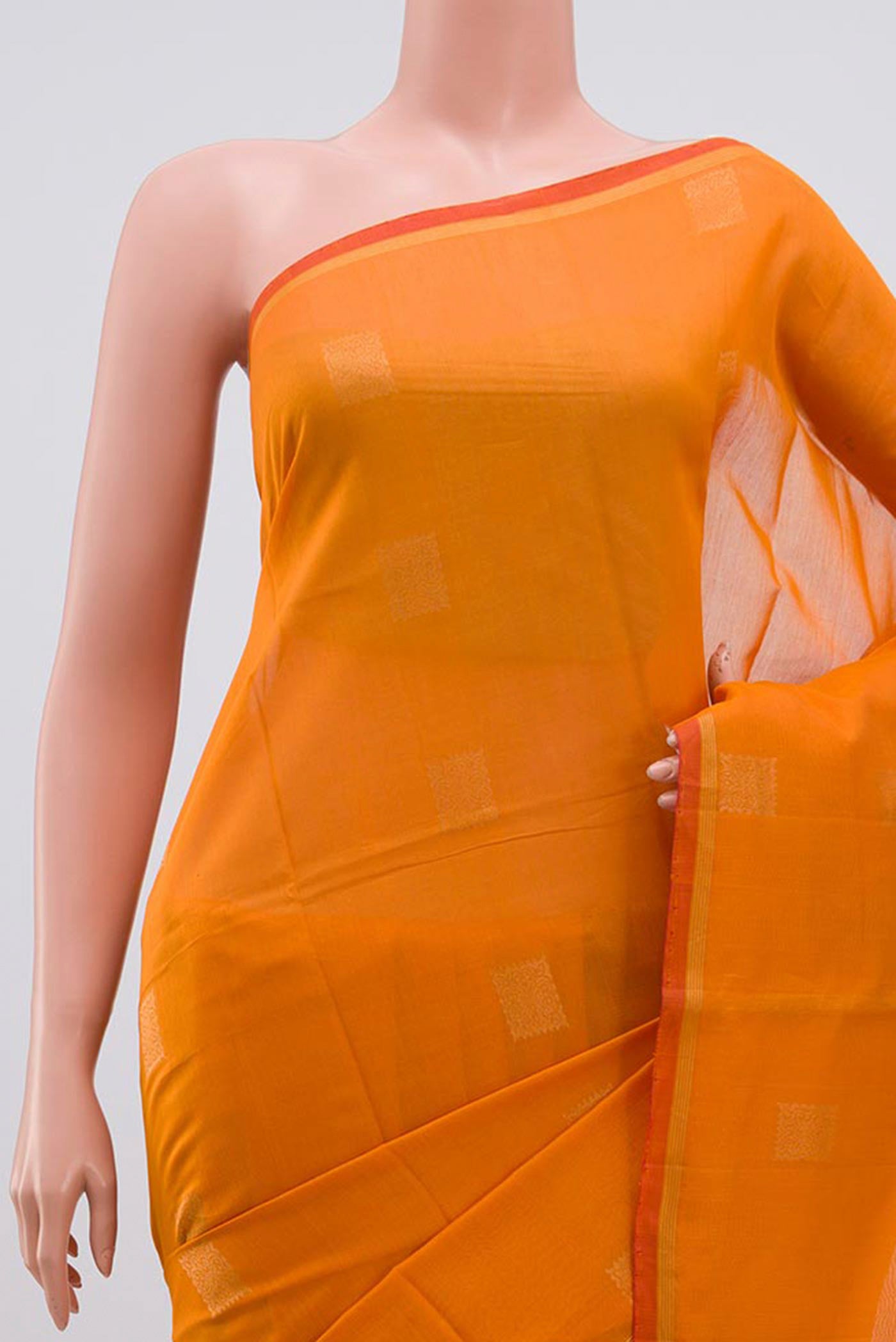 Border image of Orange Coimbatore Silk Cotton Saree with Zari Butta on the body and Zari Border. 