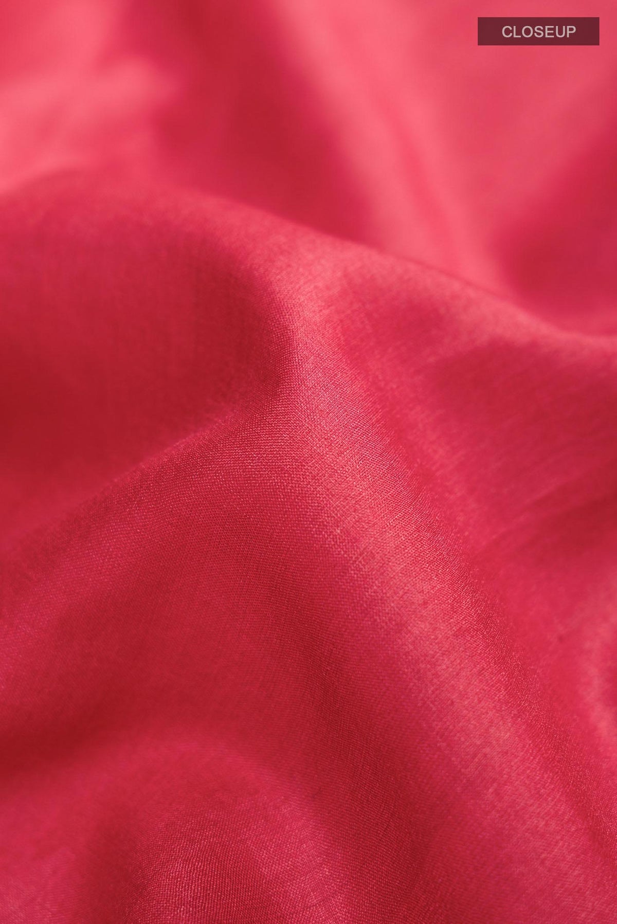 Close up of Red Bhagalpuri Tussar Silk Saree With with Plain Body and Printed Border displaying folds