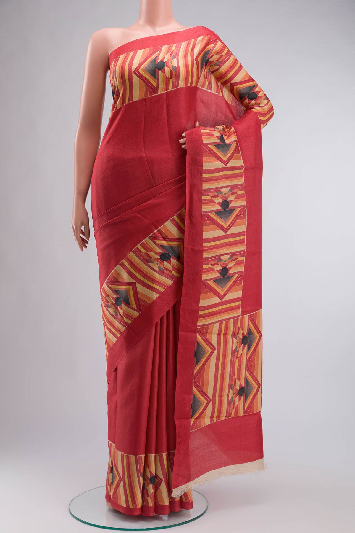 Red Bhagalpuri Tussar Silk Saree With with Plain Body and Printed Border displayed on a mannequin