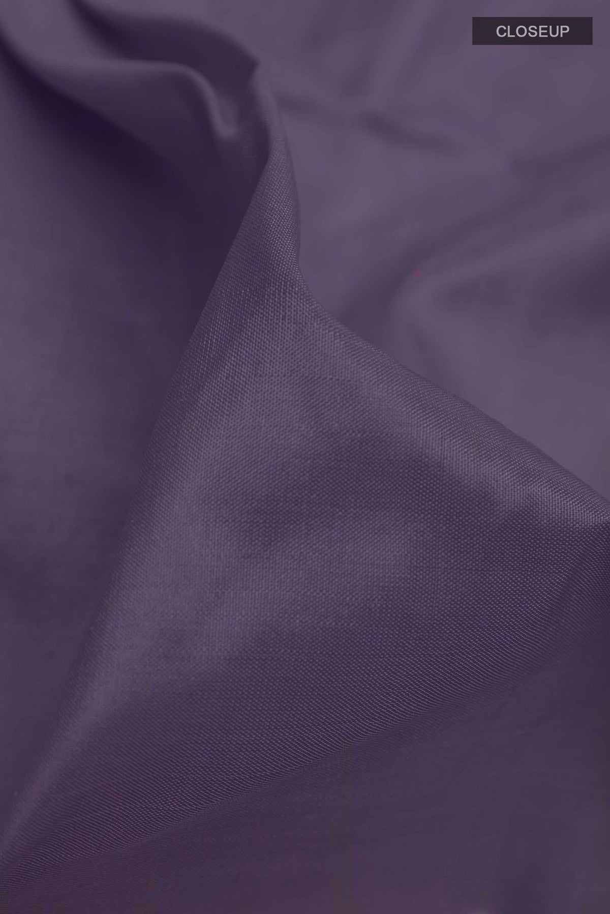 Close up of Navy Blue Silk Cotton Saree with Plain Body and Zari Border displaying folds