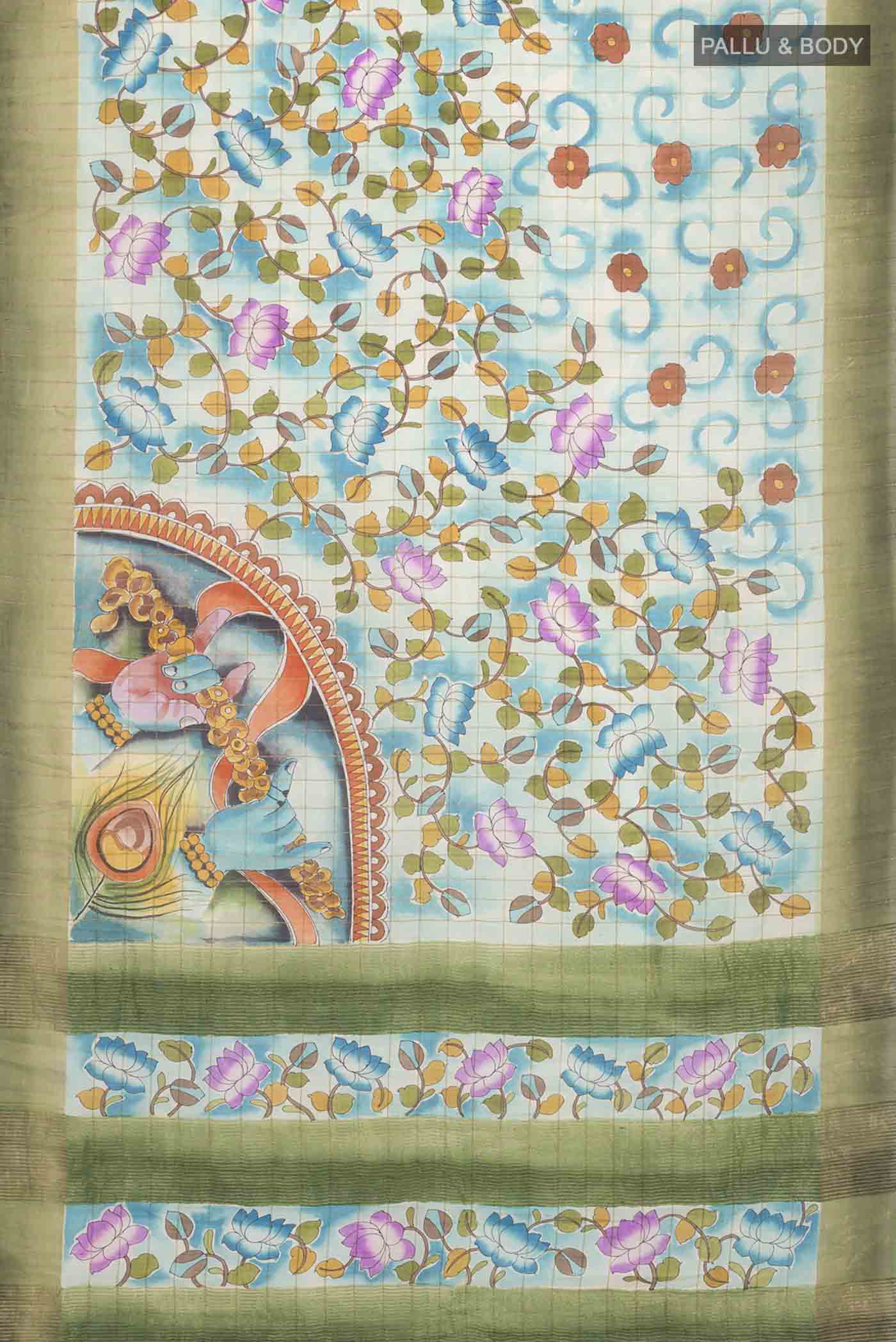 Flat view of Blue Tussar Silk Saree with Printed design on the body and Zari Border
