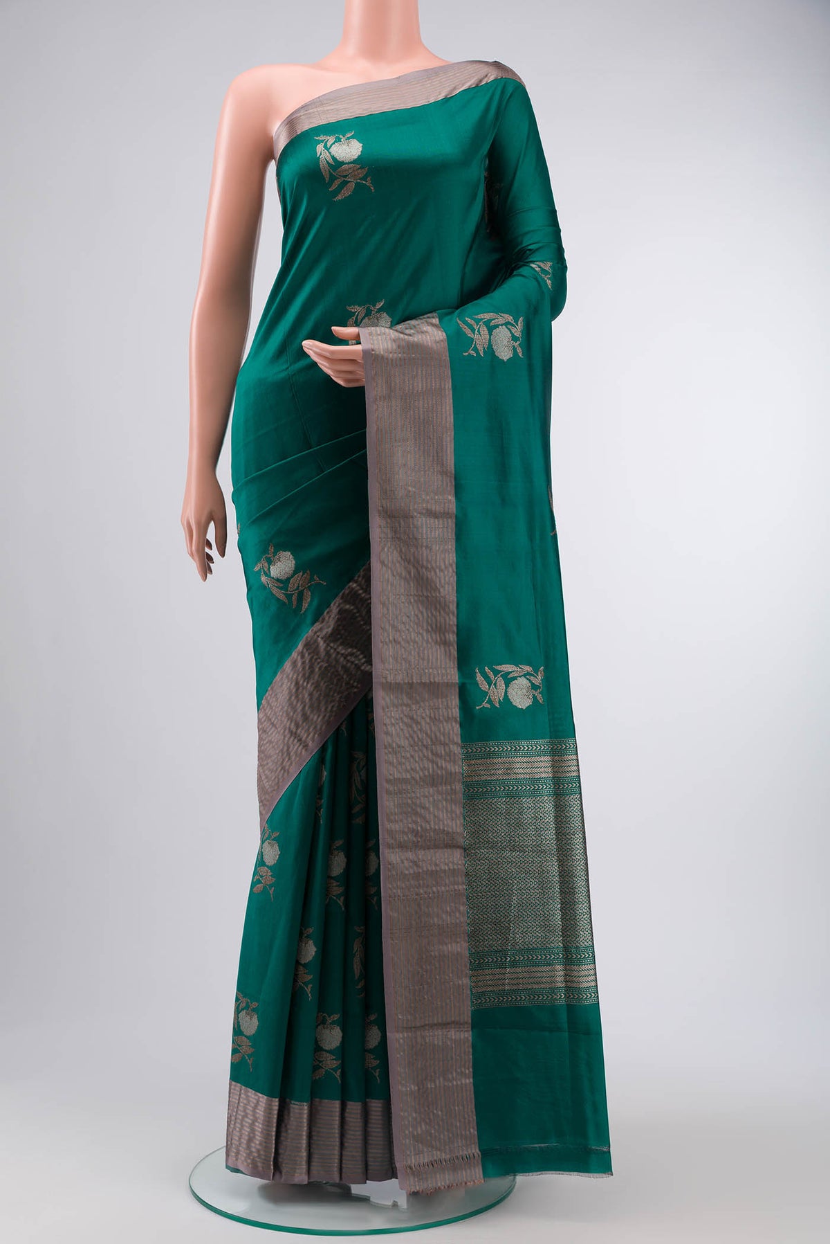 Teal Banarasi Katan Silk Saree with Zari Butta on the body and Satin Border displayed on a mannequin