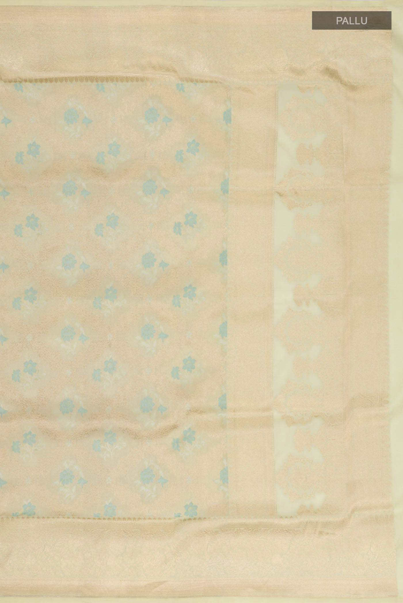 Close up image of the pallu of Beige Banarasi Silk Saree with Zari And Thread Butta on the body and Zari Border
